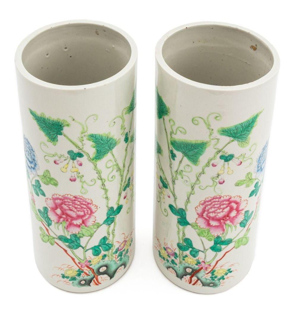 Pair of Chinese Famille Rose Porcelain Hat Stands, hand-painted with floral motifs. 11.75