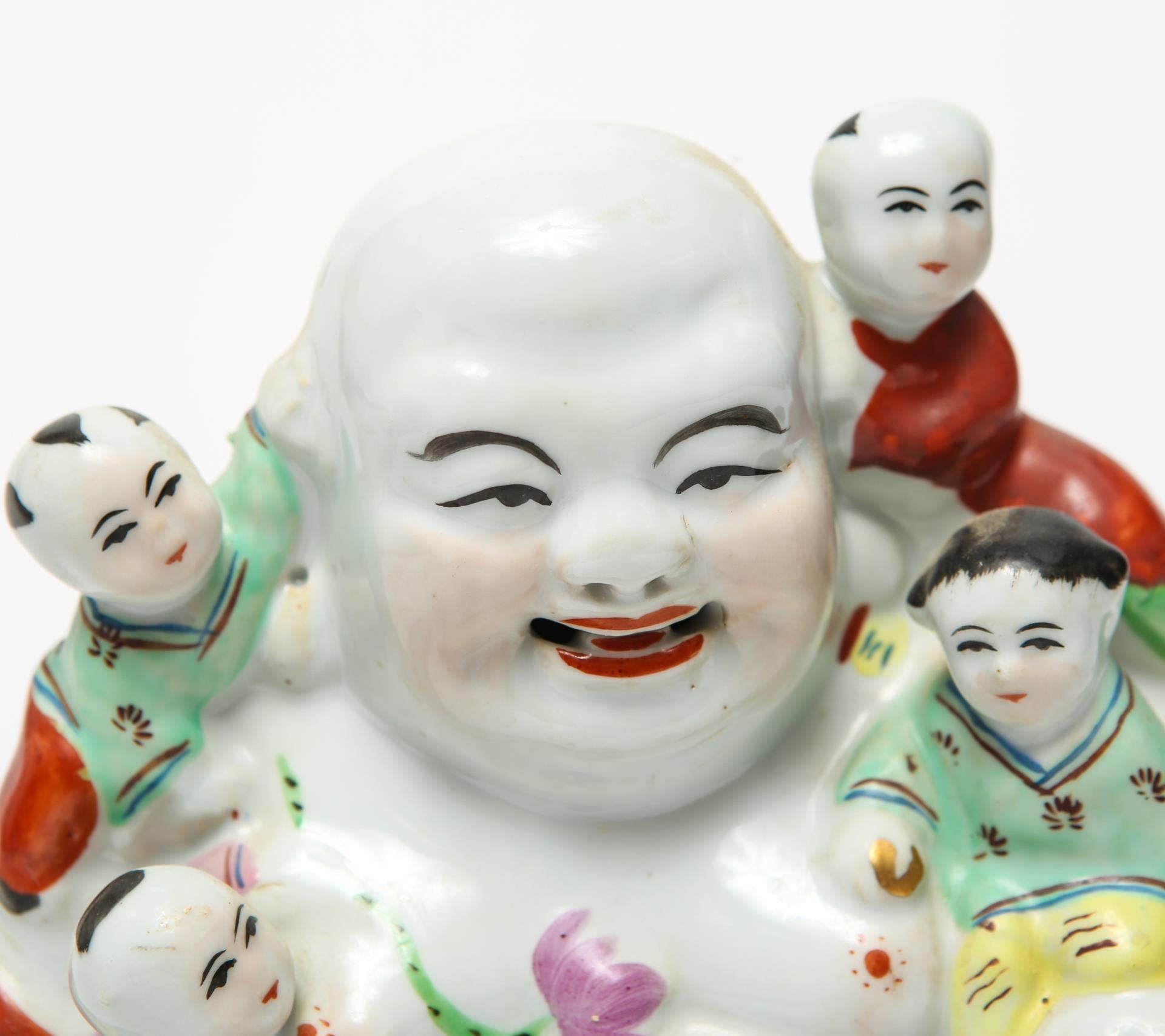 porcelain laughing buddha