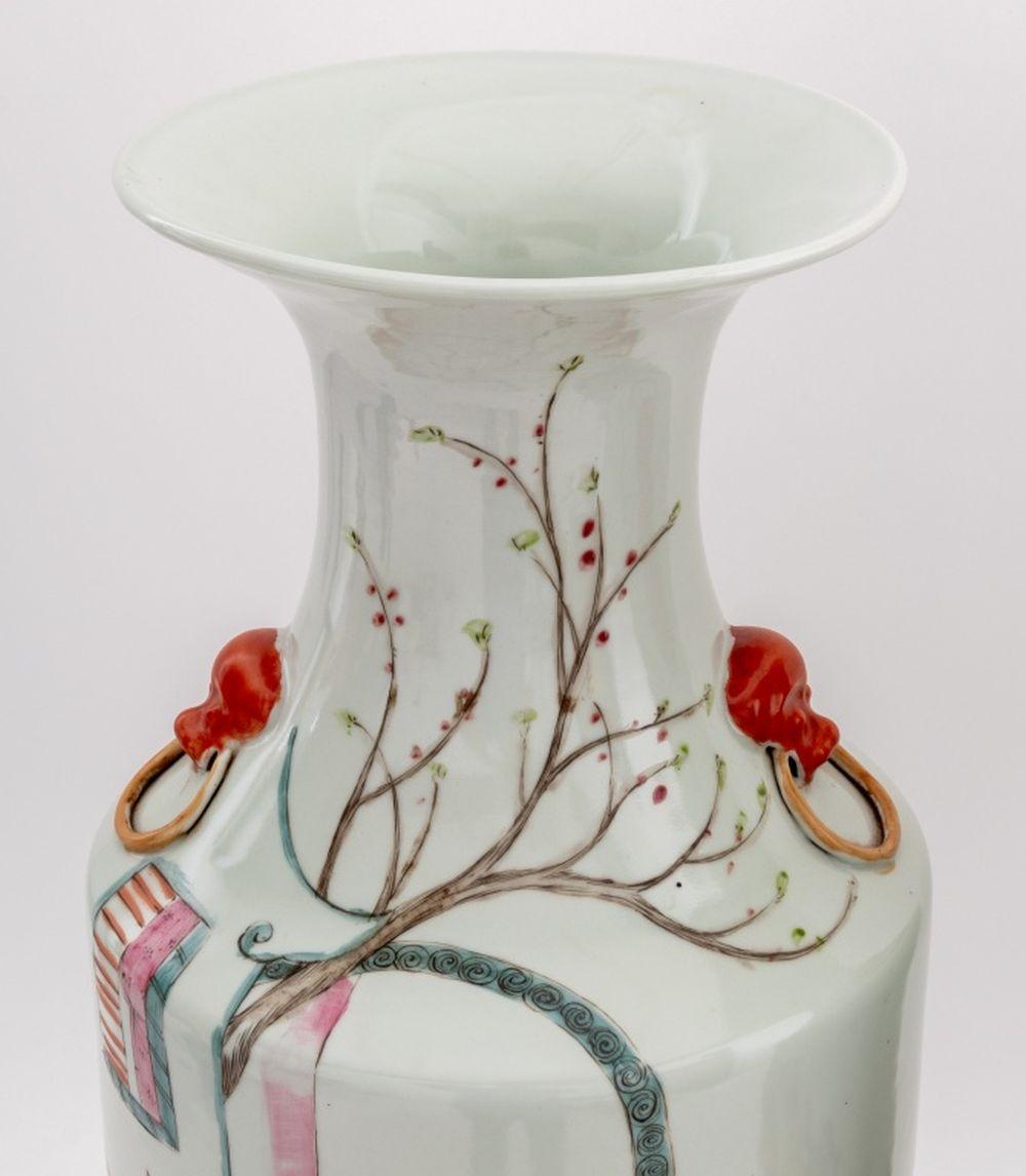 Pair of Chinese Famille Rose Porcelain Large Baluster Vases, hand-painted with figural landscape scenes and each with two masque and ring form handles. 23