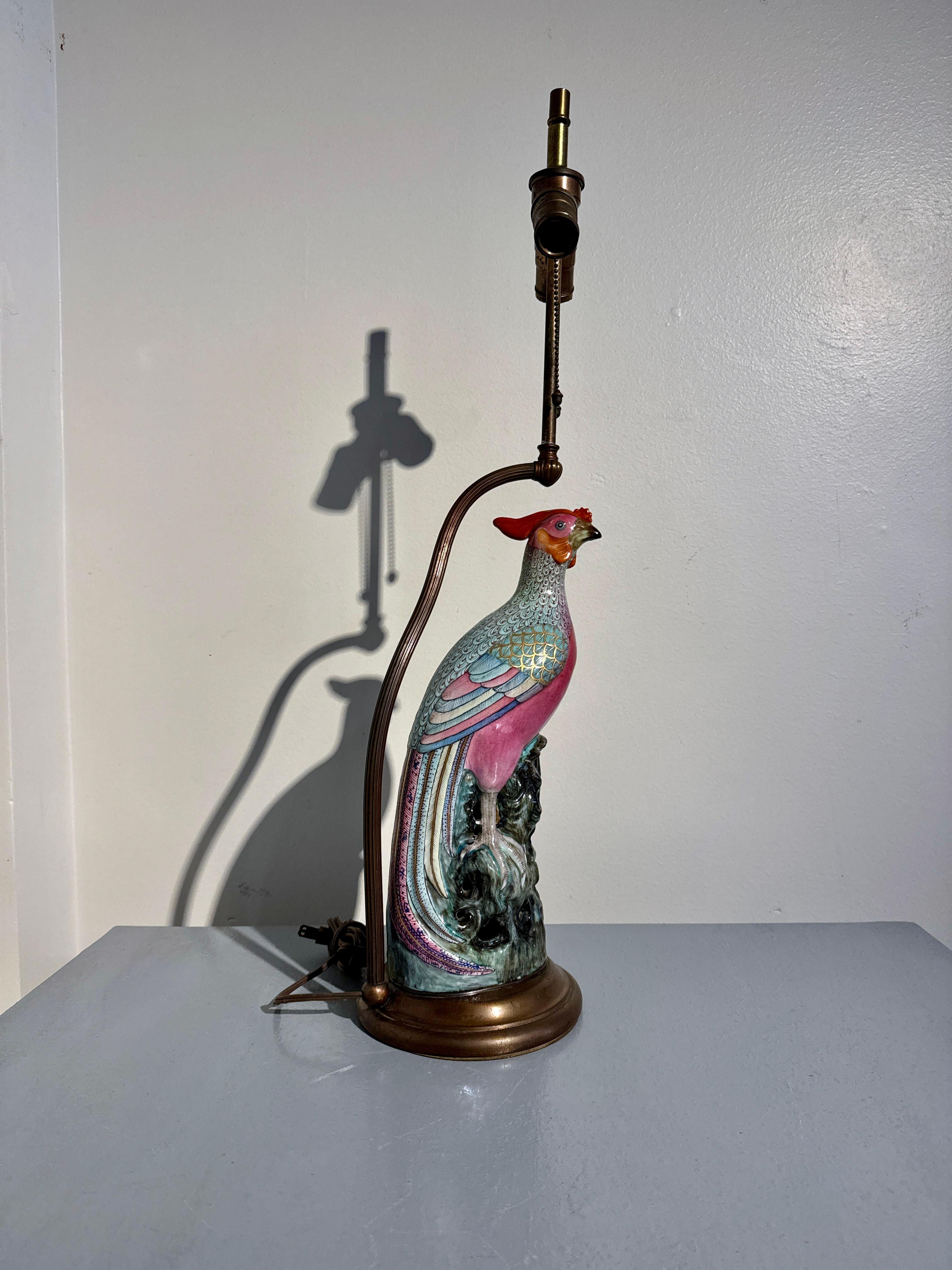 An elegant and colorful Chinese export famille rose porcelain model of a pheasant, marked Pan Yunlong, now mounted as a two-light table lamp, early 20th century, Republic Period, circa 1920, China (the porcelain) and USA (the lamp). 

The pheasant
