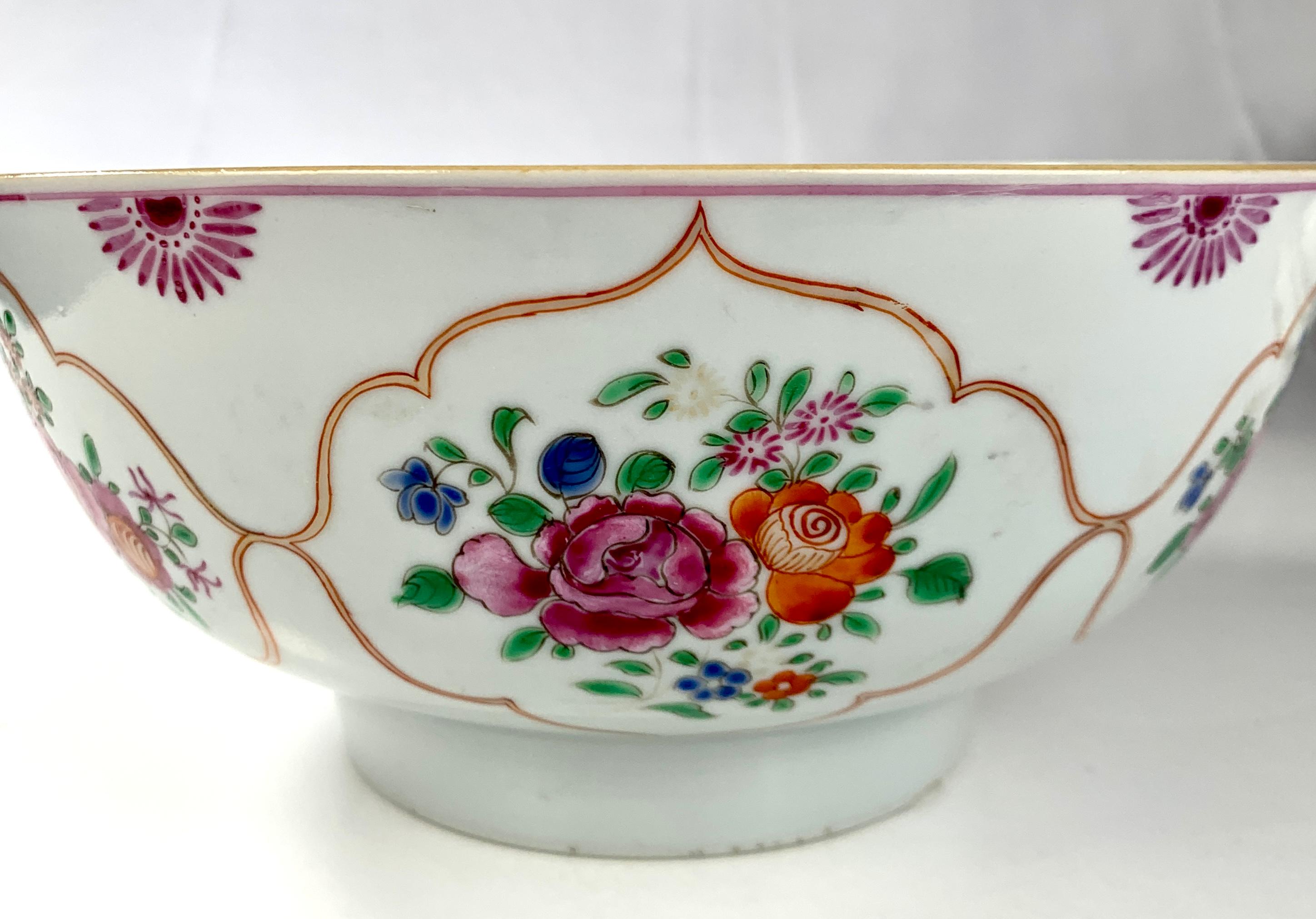 This lovely Chinese Famille Rose porcelain bowl is decorated to the outside with pink and orange peonies surrounded by small green and blue leaves.
The beautiful decoration is set inside six cloud collars that encircle the bowl.
In Chinese