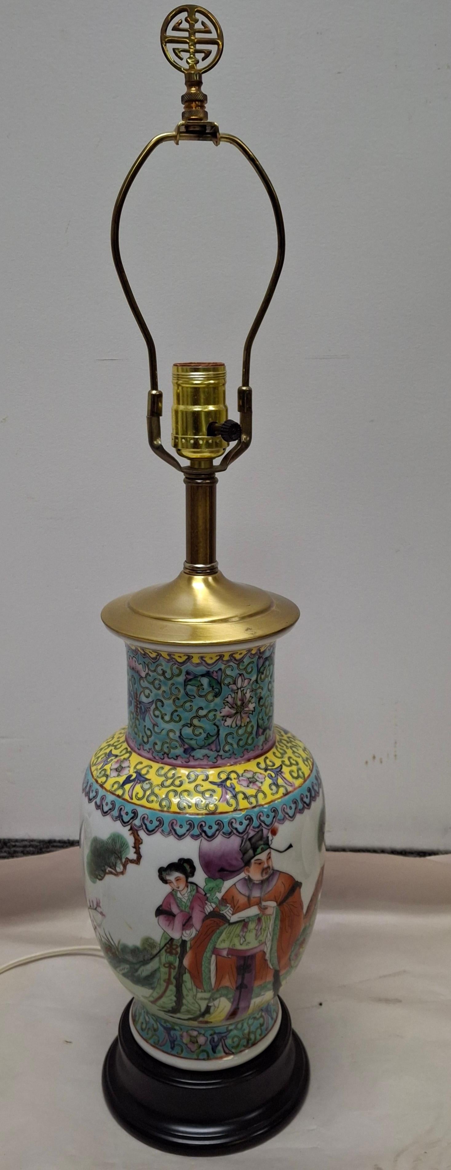 A Chinese Famille Rose Porcelain Table Lamp with Ebonized Base
Measures 6