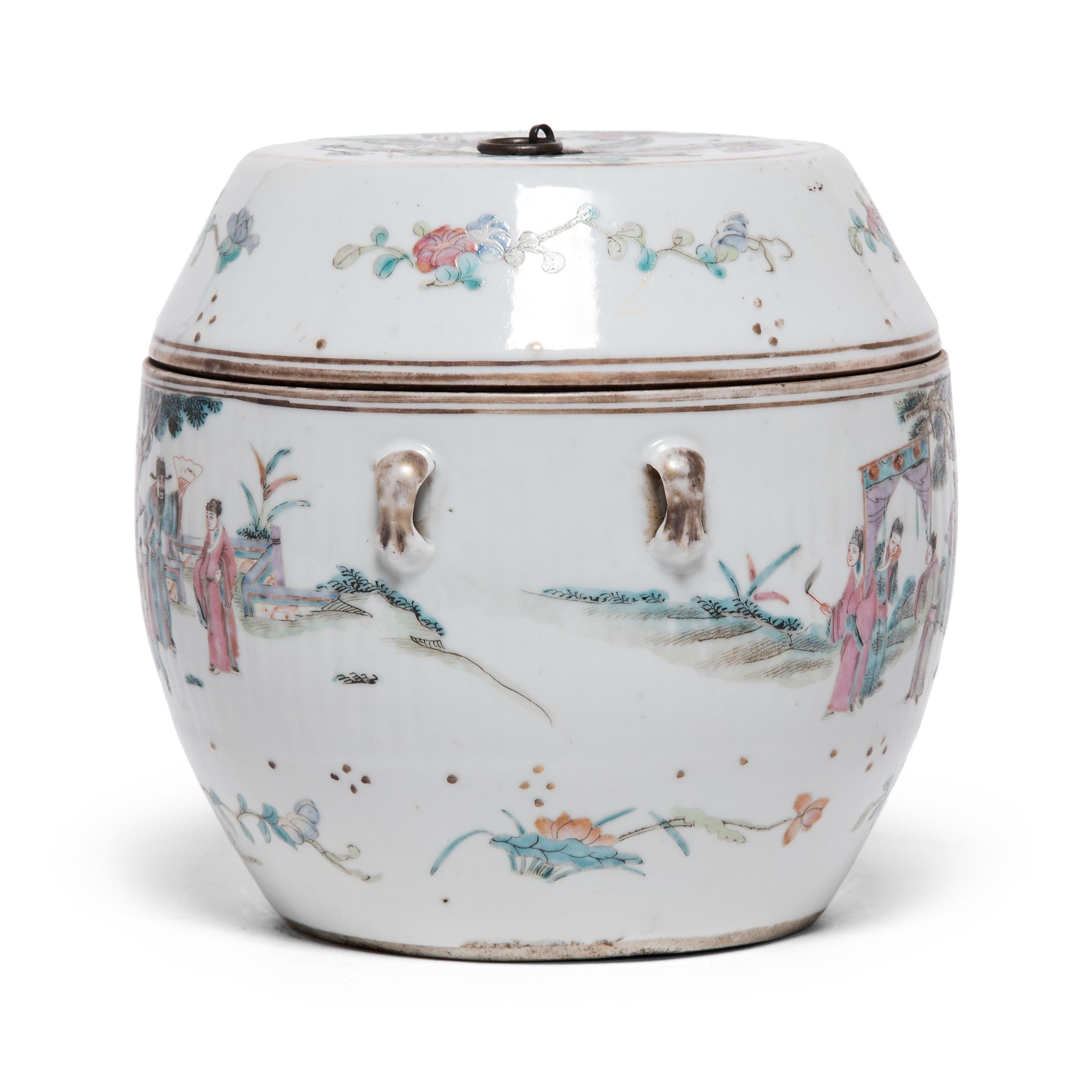 This late 19th century covered jar takes its rounded shape from serving tureens used to serve soups and stews. Contrasted by a crisp white field, the lid and sides are intricately decorated with scenes of a Ming-dynasty courtly gathering. Surrounded