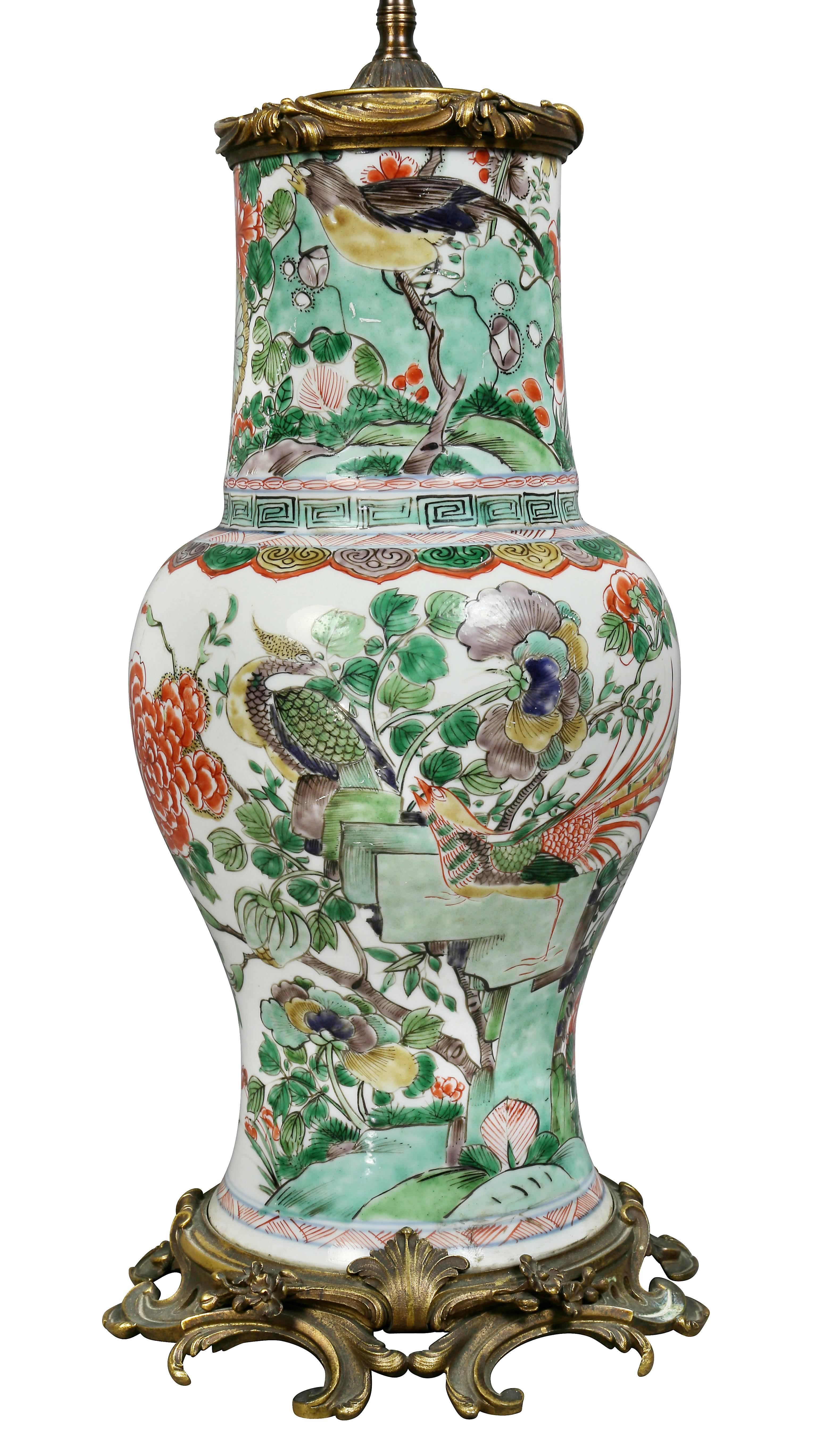 Early vase with cut down neck with ormolu mounts.