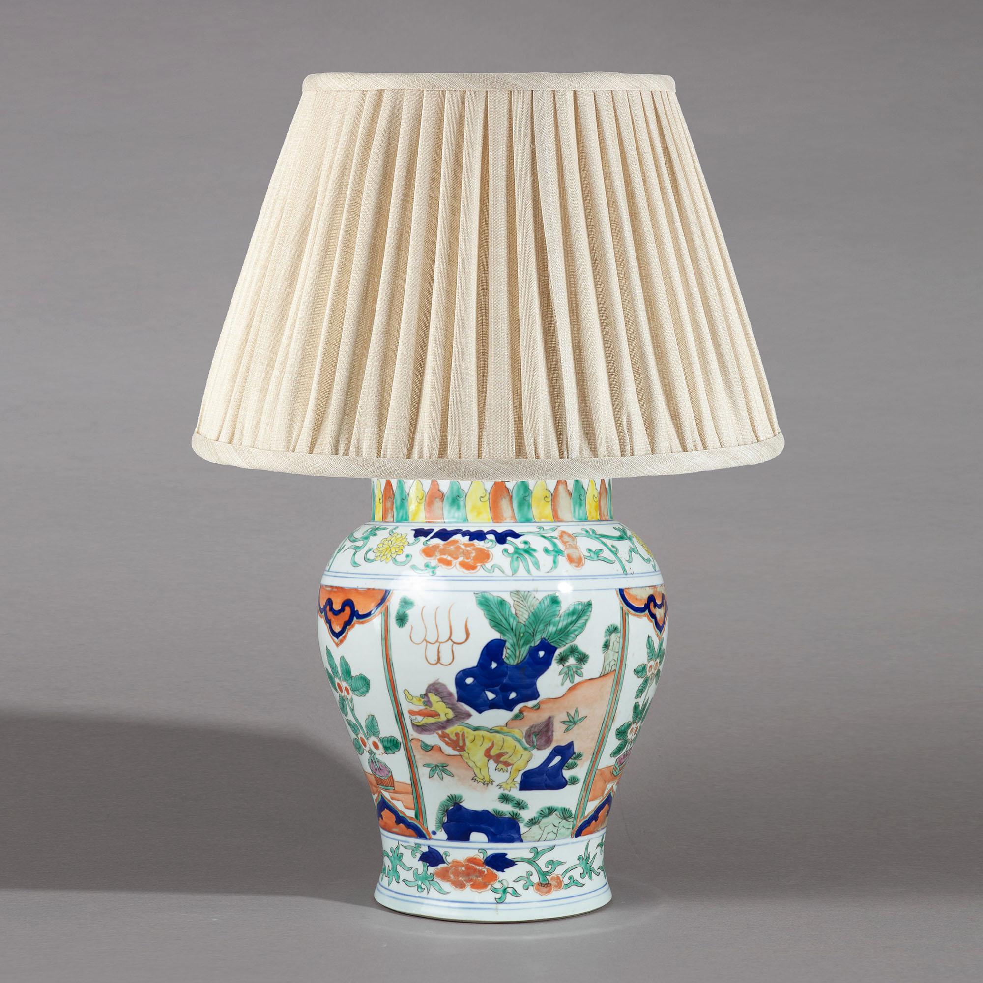 19th-20th century Chinese Famille Verte porcelain vase as a table lamp - wonderfully decorative in rich and vibrant palette. 

Measures: Height (to the top of the vase) 31cm
Diameter of vase 25cm.