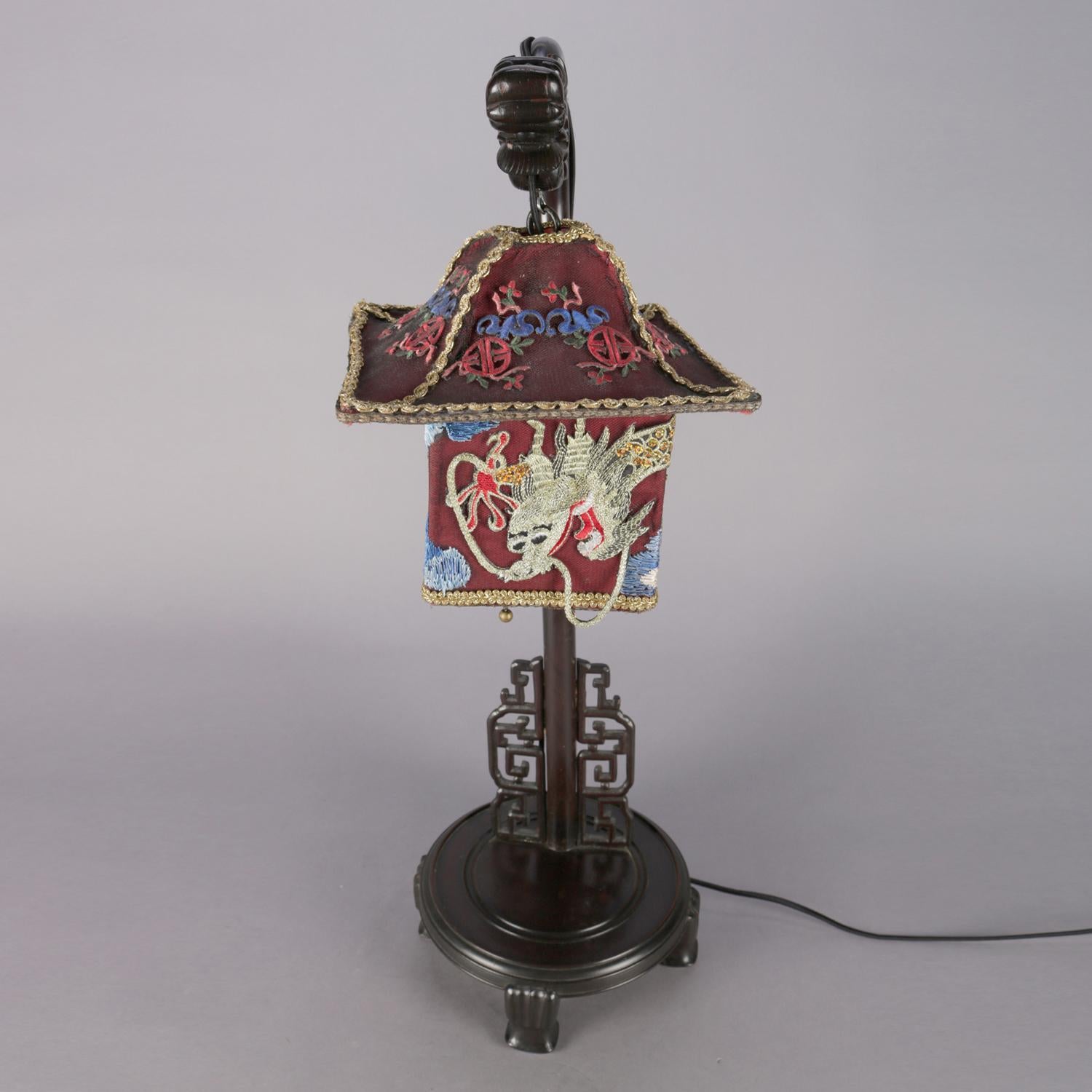 20th Century Chinese Figural Carved Hardwood Dragon Desk Lamp, Embroidered Pagoda Shade
