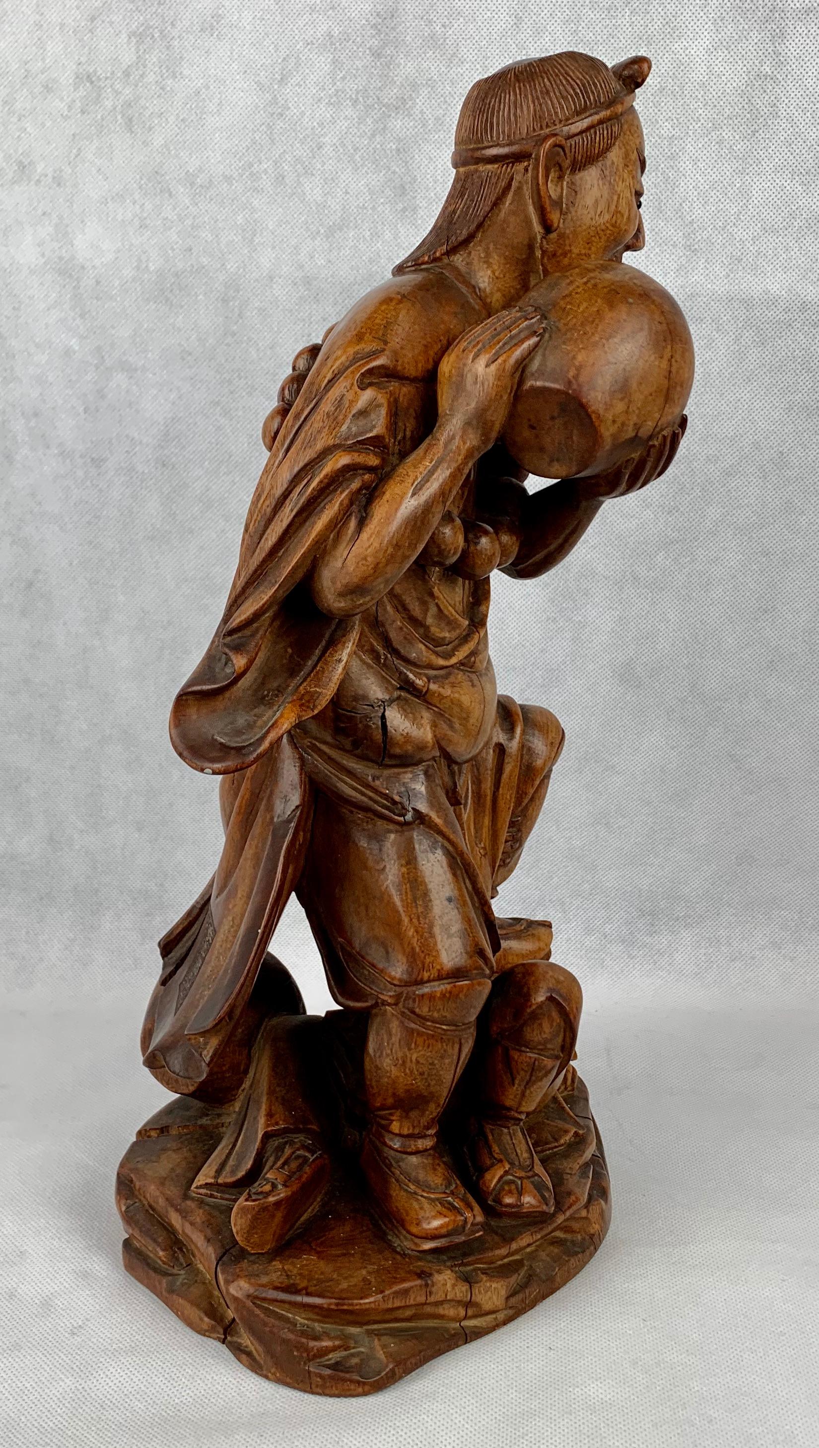 Chinoiserie Hand Carved Teak Chinese Male Figure with Boy For Sale