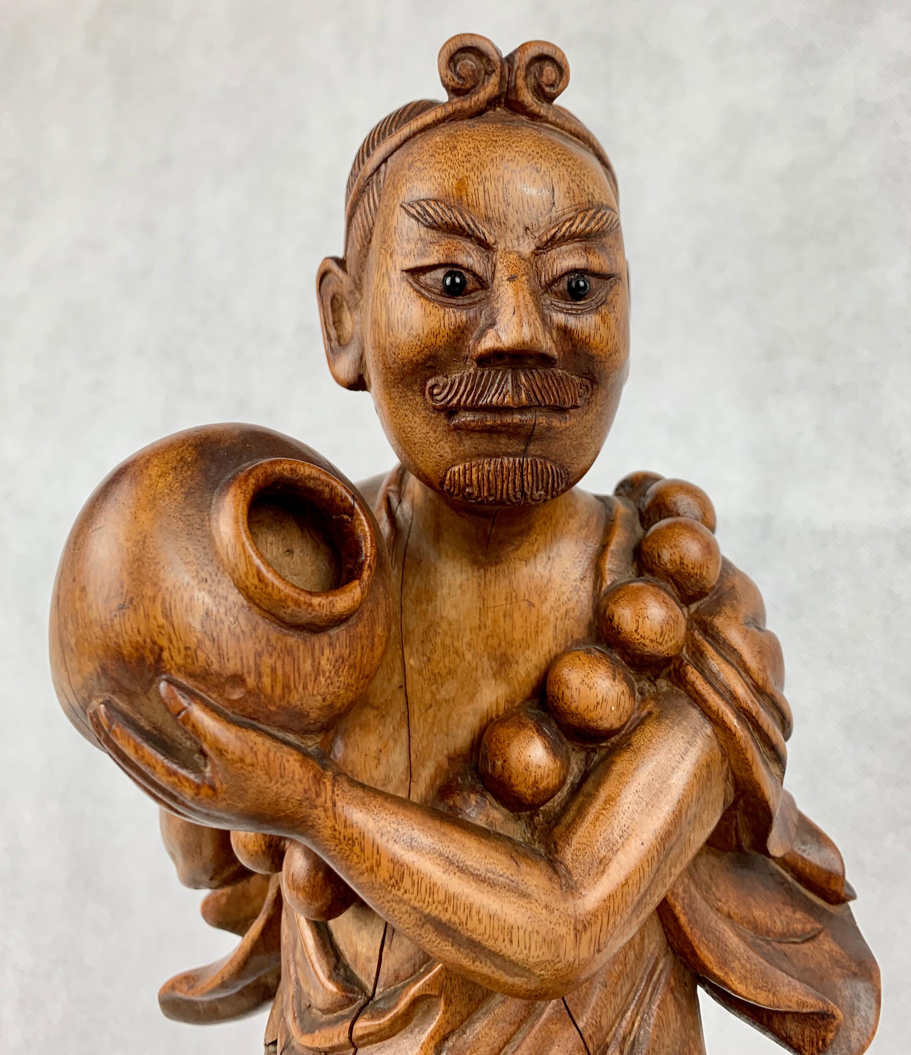 Hand Carved Teak Chinese Male Figure with Boy In Good Condition For Sale In West Palm Beach, FL