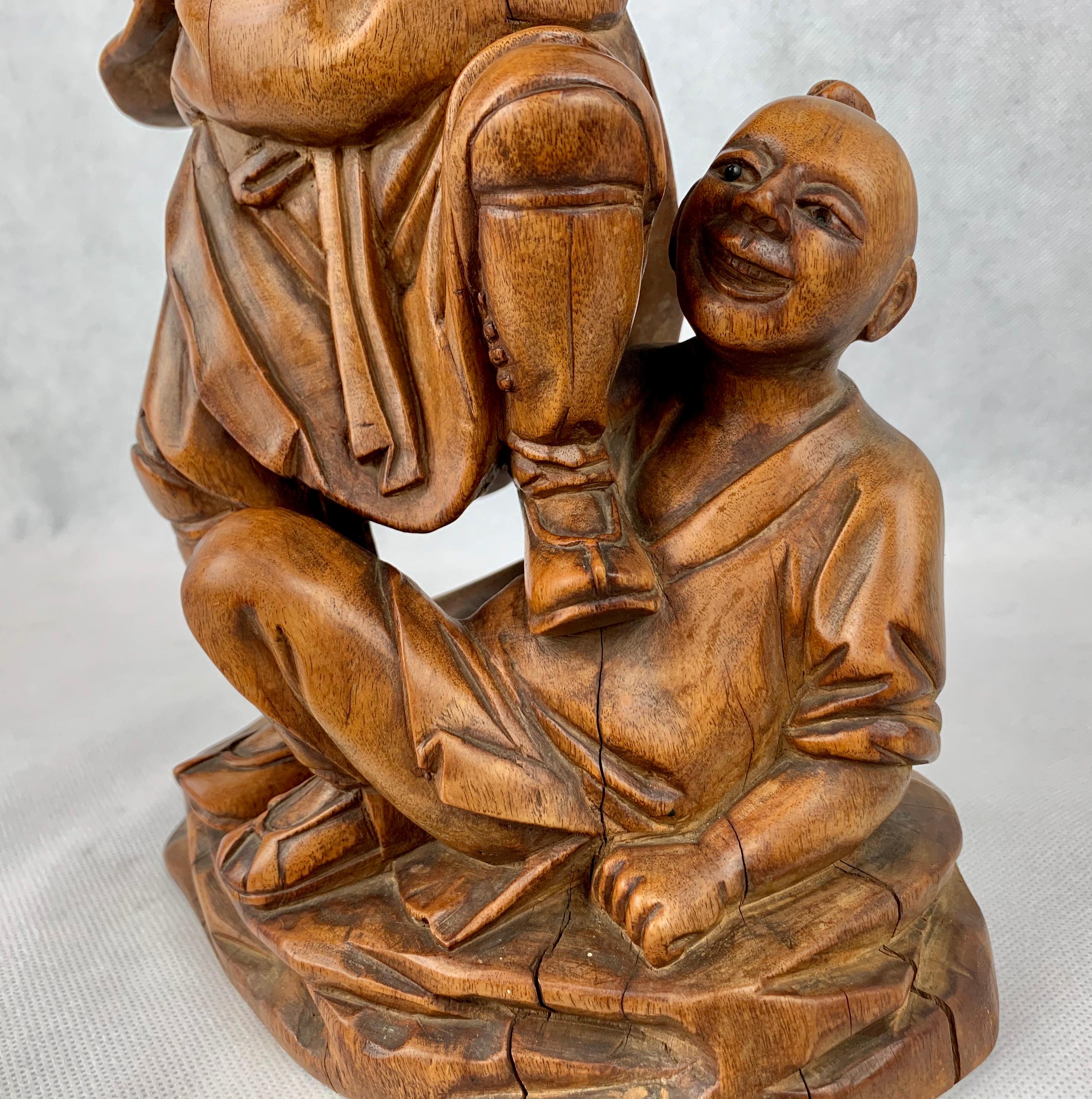 Hand Carved Teak Chinese Male Figure with Boy For Sale 2