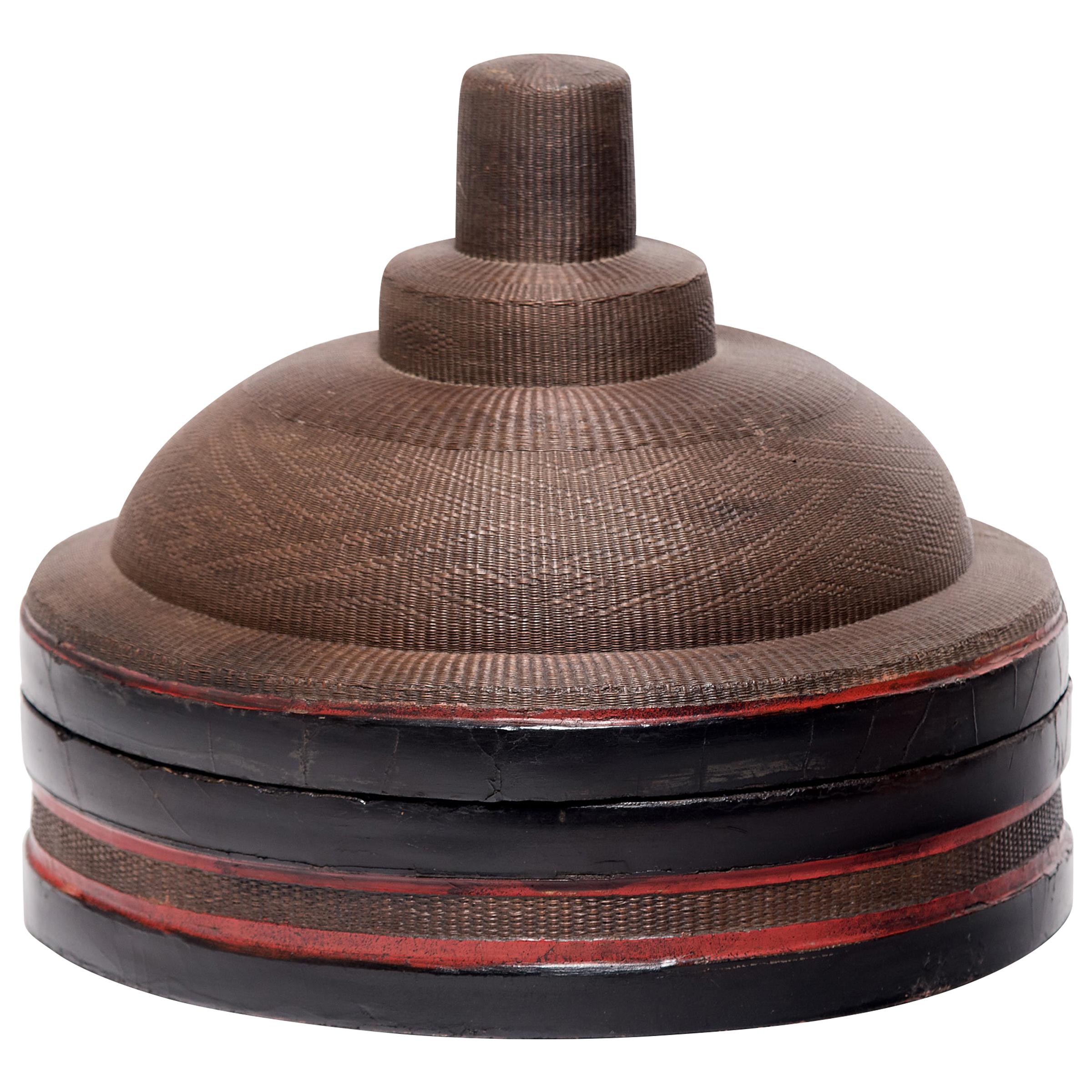 No self-respecting man in Qing-dynasty China would leave the house without some kind of hat. In fact, headgear was so central to social status that even the containers used to store one's hat were beautifully constructed.

Finely woven with an