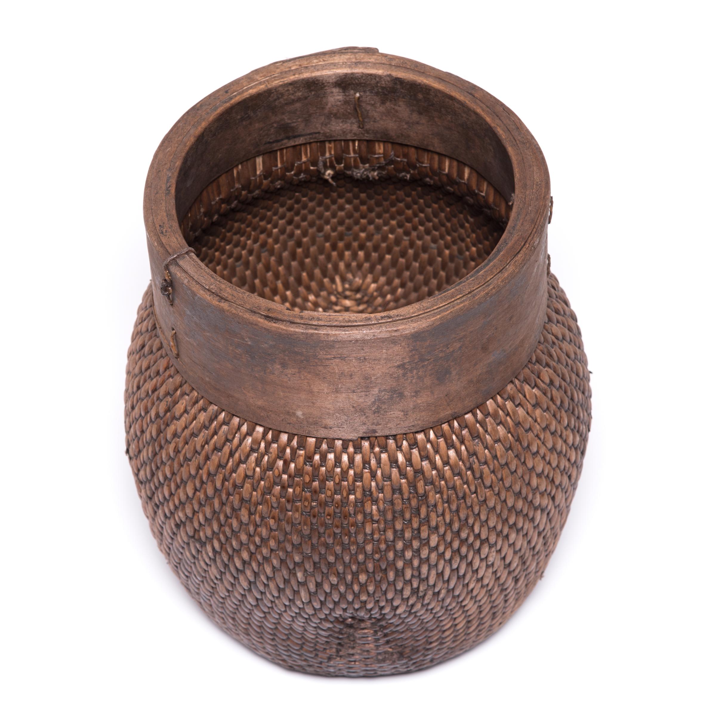 This listing includes one Chinese fisherman's basket, c. 1900 (LU820023013372) and one Chinese pickling basin, c. 1900 (LU820018130802). 