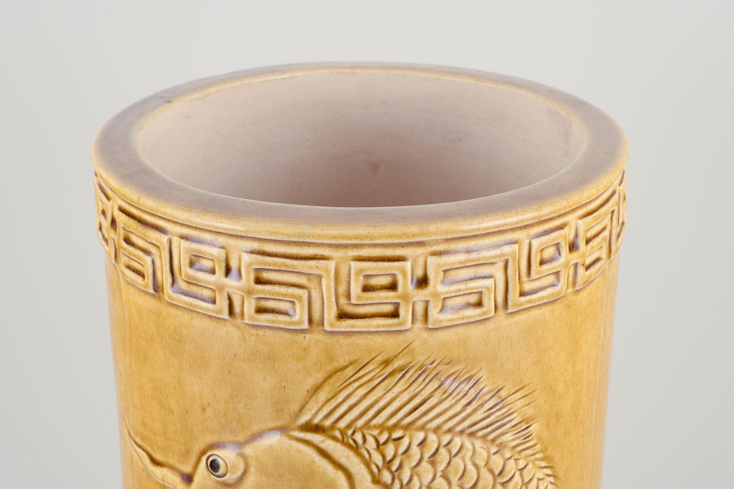 Glazed Chinese floor vase made of earthenware. Motif of fish on the seabed. For Sale