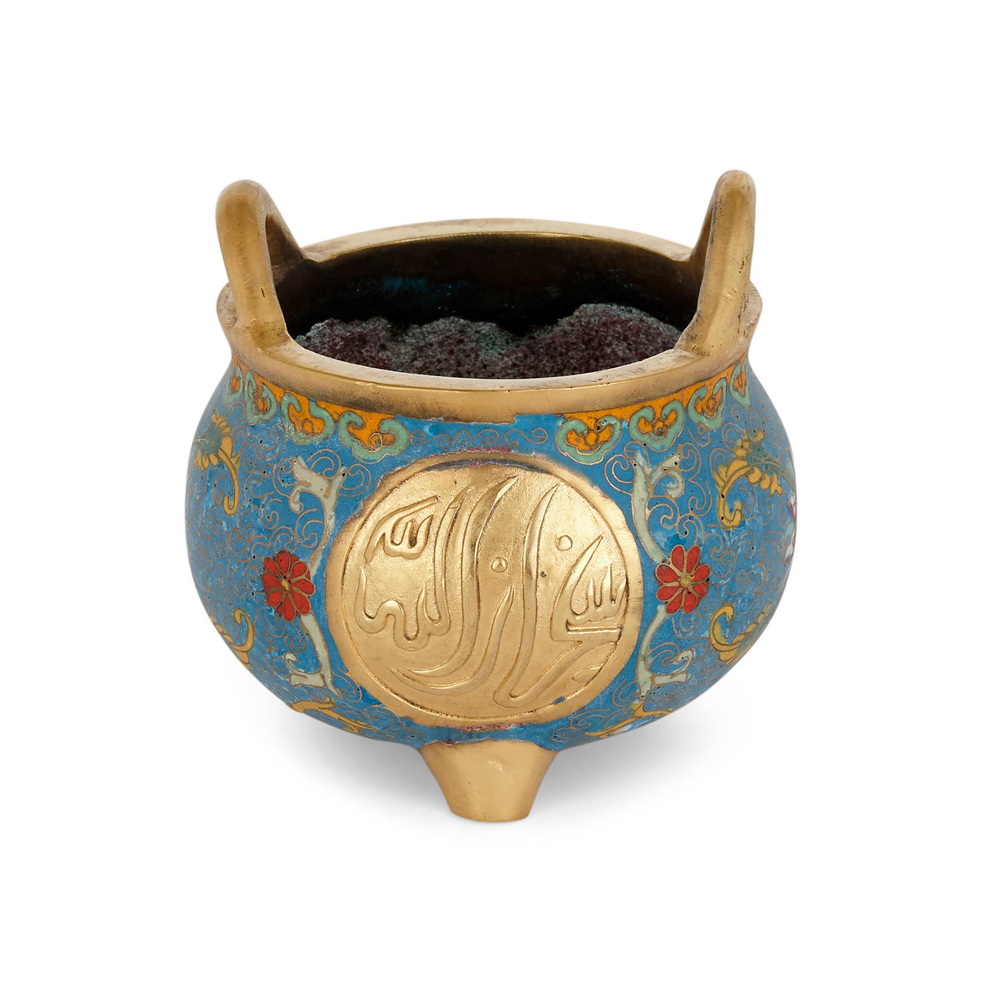Chinese Floral Islamic style cloisonné enamel and Ormolu vase
Chinese, early 20th century
Dimensions: Height 14cm, diameter 14cm

This beautiful bowl is a superb example of Chinese export ware designed for an Islamic market. The bowl is crafted
