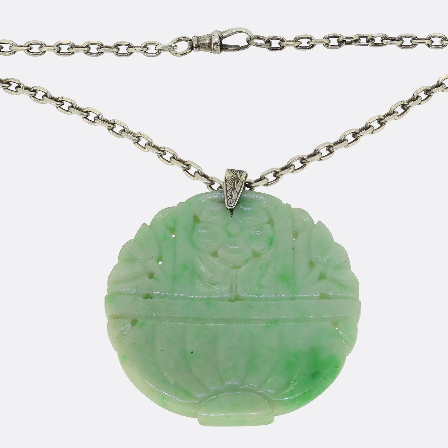 This elegant mottled Chinese jade pendant features three beautifully detailed flowers in a pot, complete with a little silver clasp and hangs from a matching silver belcher chain.

Condition: Used (Excellent)
Weight: 34.5 grams
Pendant Dimensions: