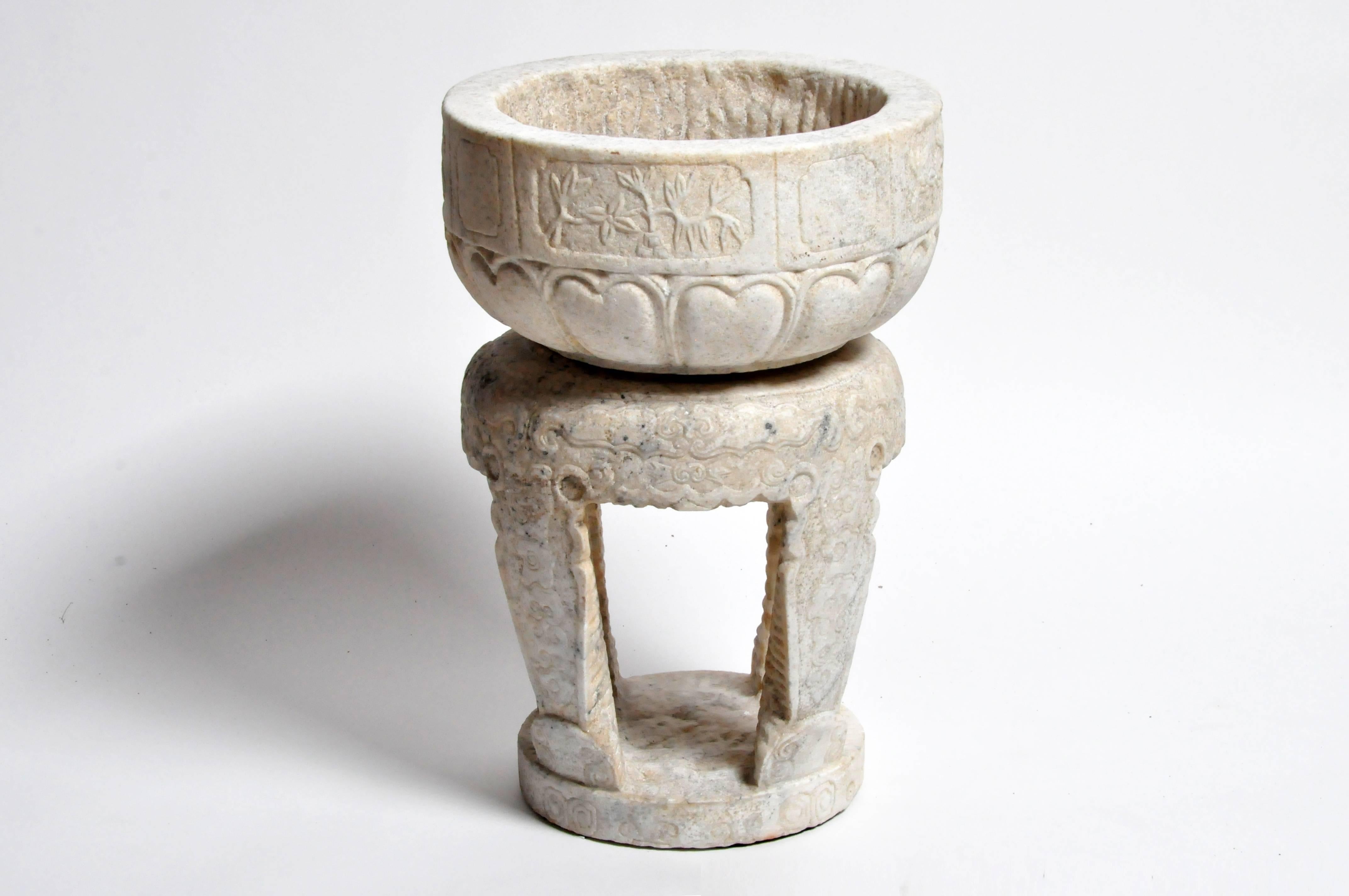 This flower pot is from Hebei, China and was made from marble. It can be used as a pedestal or a flower pot in your home or garden.