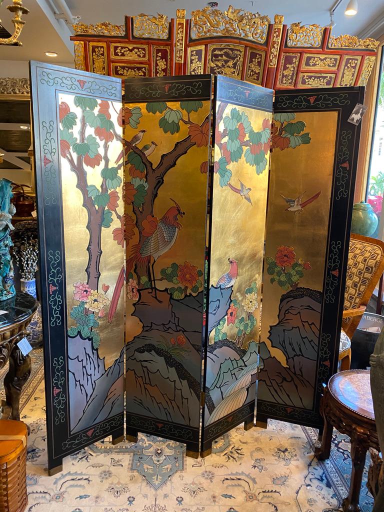 Chinese folding floor screen with four panels, two sided. Most of the ground is gold leaf with garden screen with birds and chrysanthemum. Other side had painted flowers.