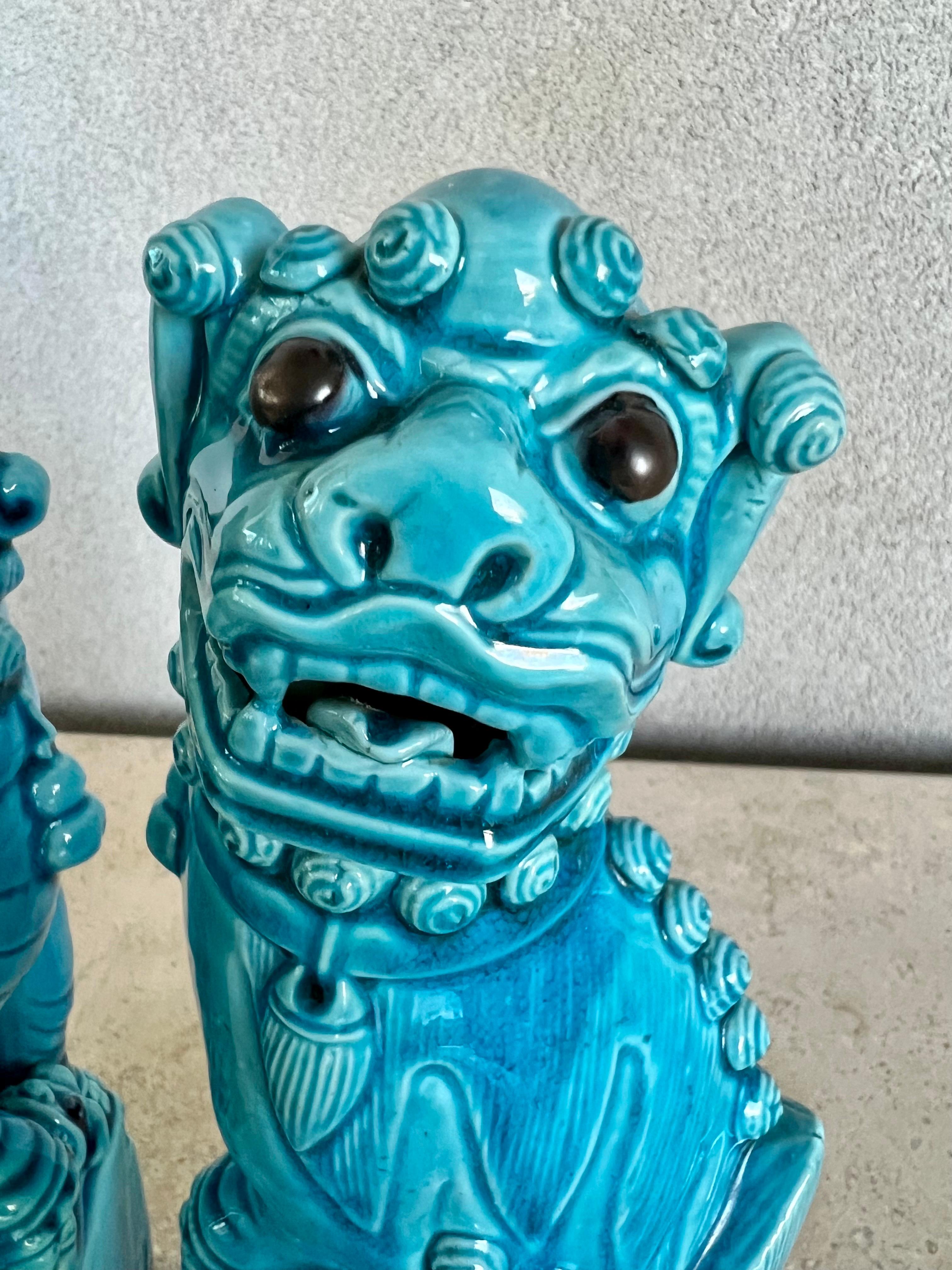 20th Century Chinese Foo Dog statues in turquoise glaze