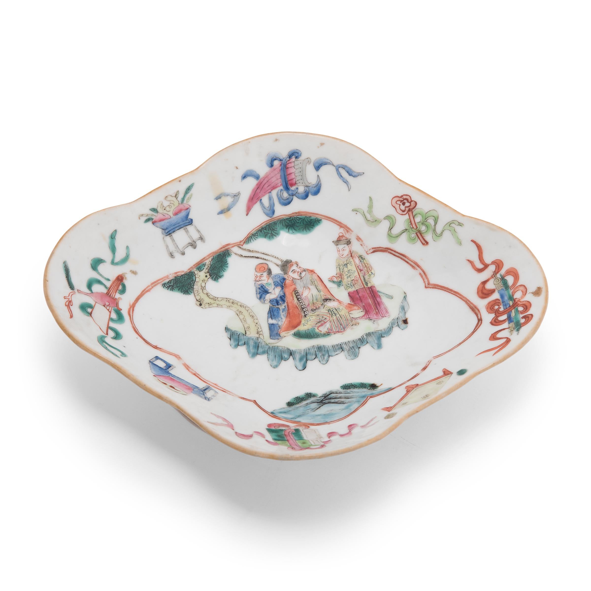 This colorful porcelain bowl dates to the mid-19th century and was originally used as a serving dish for ritual offerings, placed before a home altar and piled high with fruit, baked goods, and other foods. The dish has a shallow cartouche-shaped