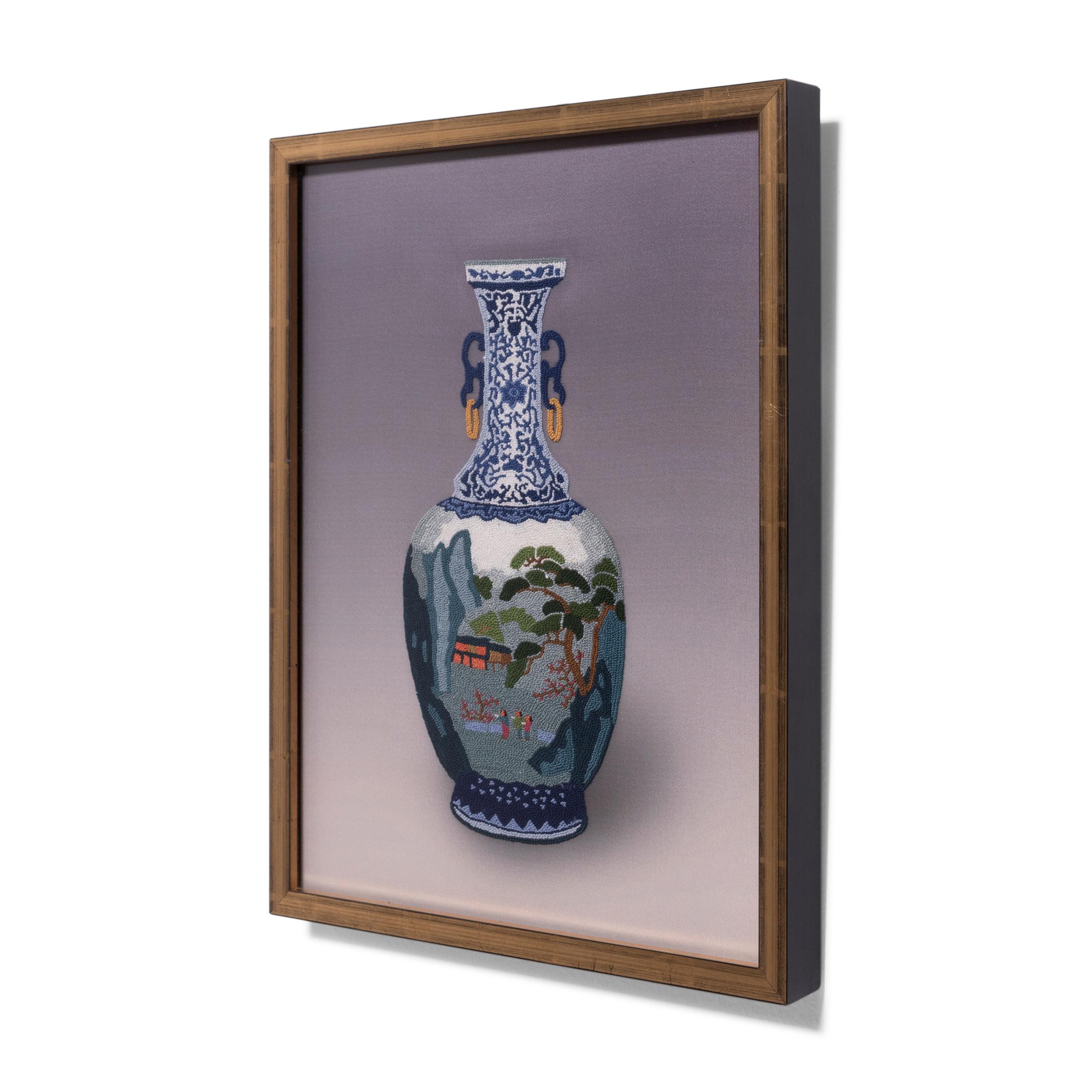 A wonderful example of Chinese embroidery, this framed silk textile uses the infamous forbidden stitch to depict a fine blue-and-white porcelain vase. Also known as the 