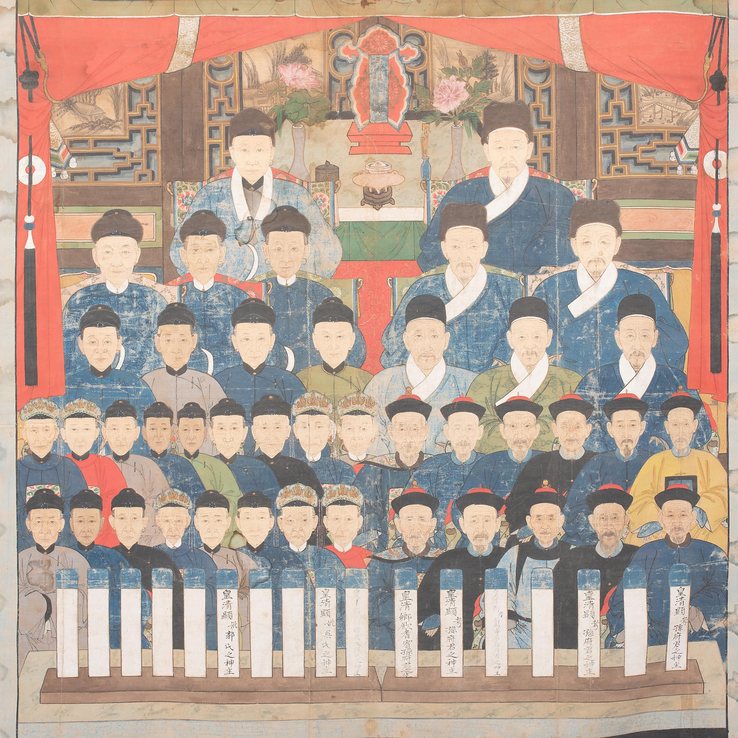 This intricately detailed composition is a late-Qing dynasty ancestor portrait depicting several generations of a family's ancestry. The painting would have been displayed in the home as the object of familial ancestor worship. When properly cared