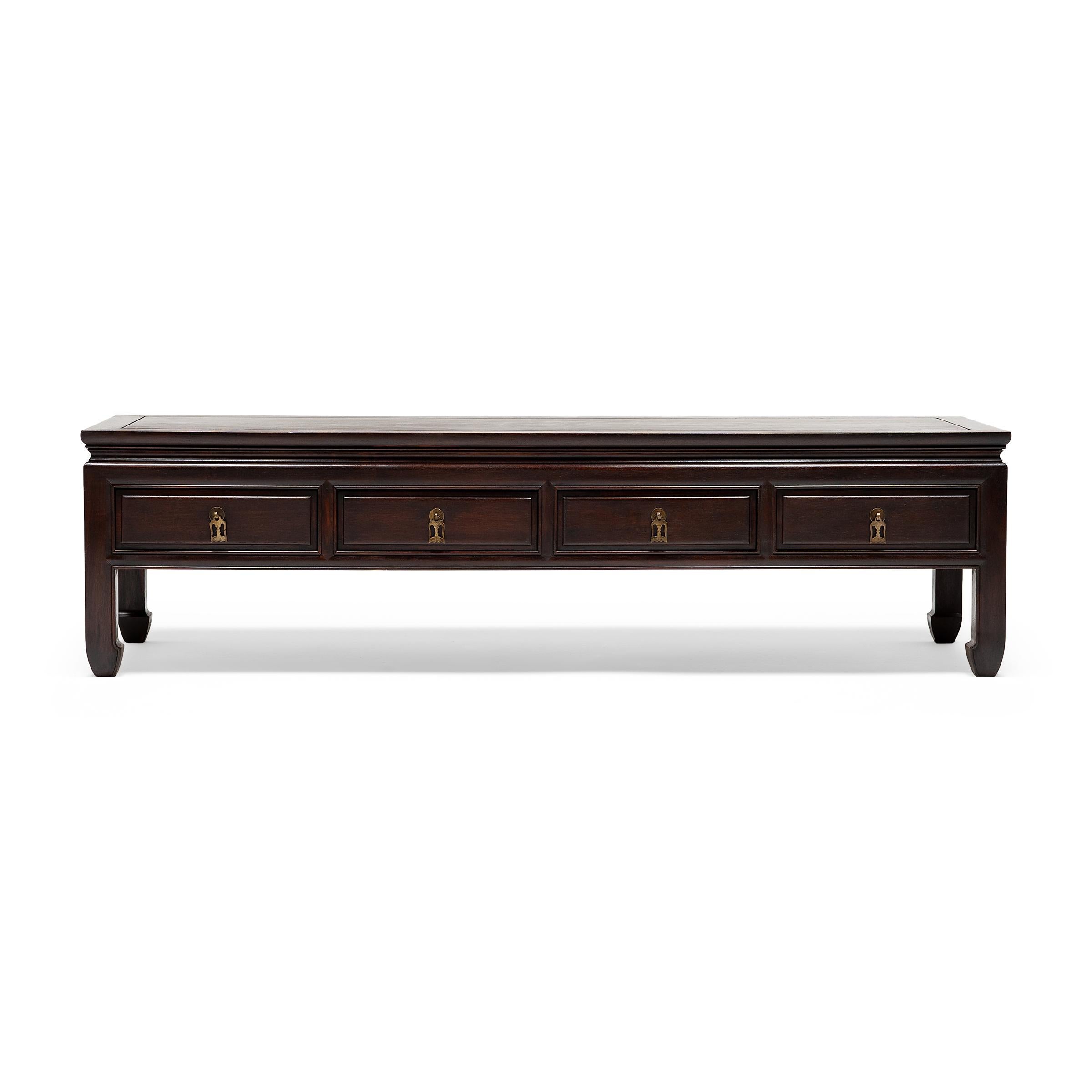 During winter in the colder provinces of China, life revolved around the kang, a heated brick platform that household members would sit or recline upon. Placed on top of the kang, low tables provided a convenient surface for dining, drinking tea, or