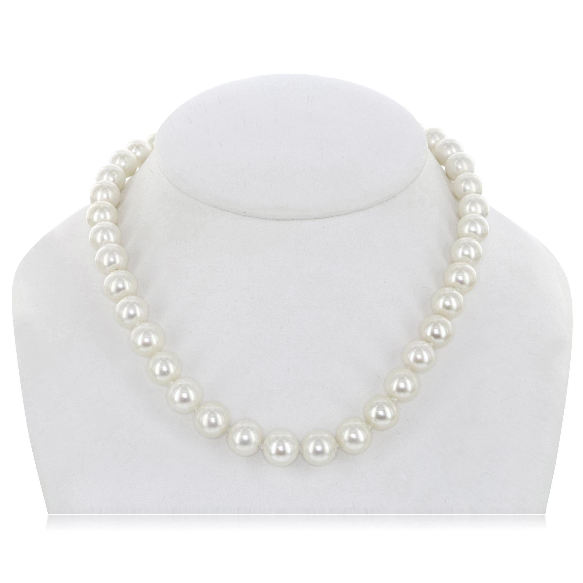 This Chinese freshwater cultured pearl necklace features round pearls measuring 9.4x10.4mm. The necklace is strung to 18 inches in length and finished with a silver color metal clasp.