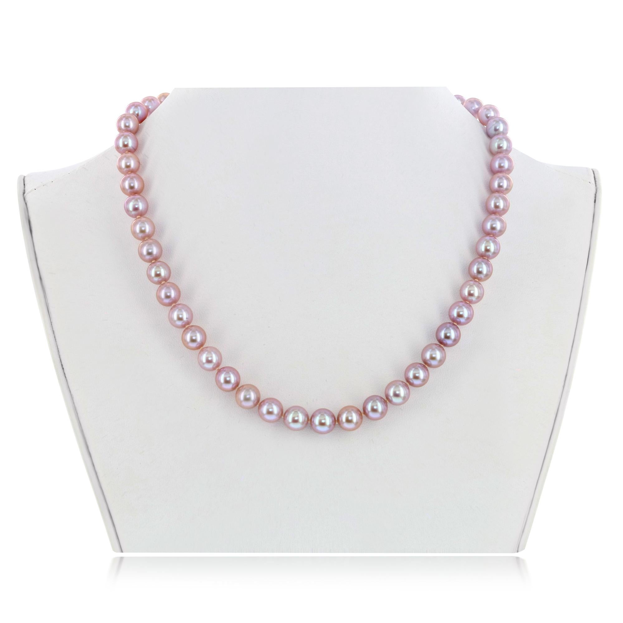 This exquisite Chinese freshwater cultured pearl necklace features distinctive, lustrous, natural color pink round pearls measuring 7-7.5mm. The necklace is strung with a classic 14K white gold filigree clasp.
This necklace makes the perfect