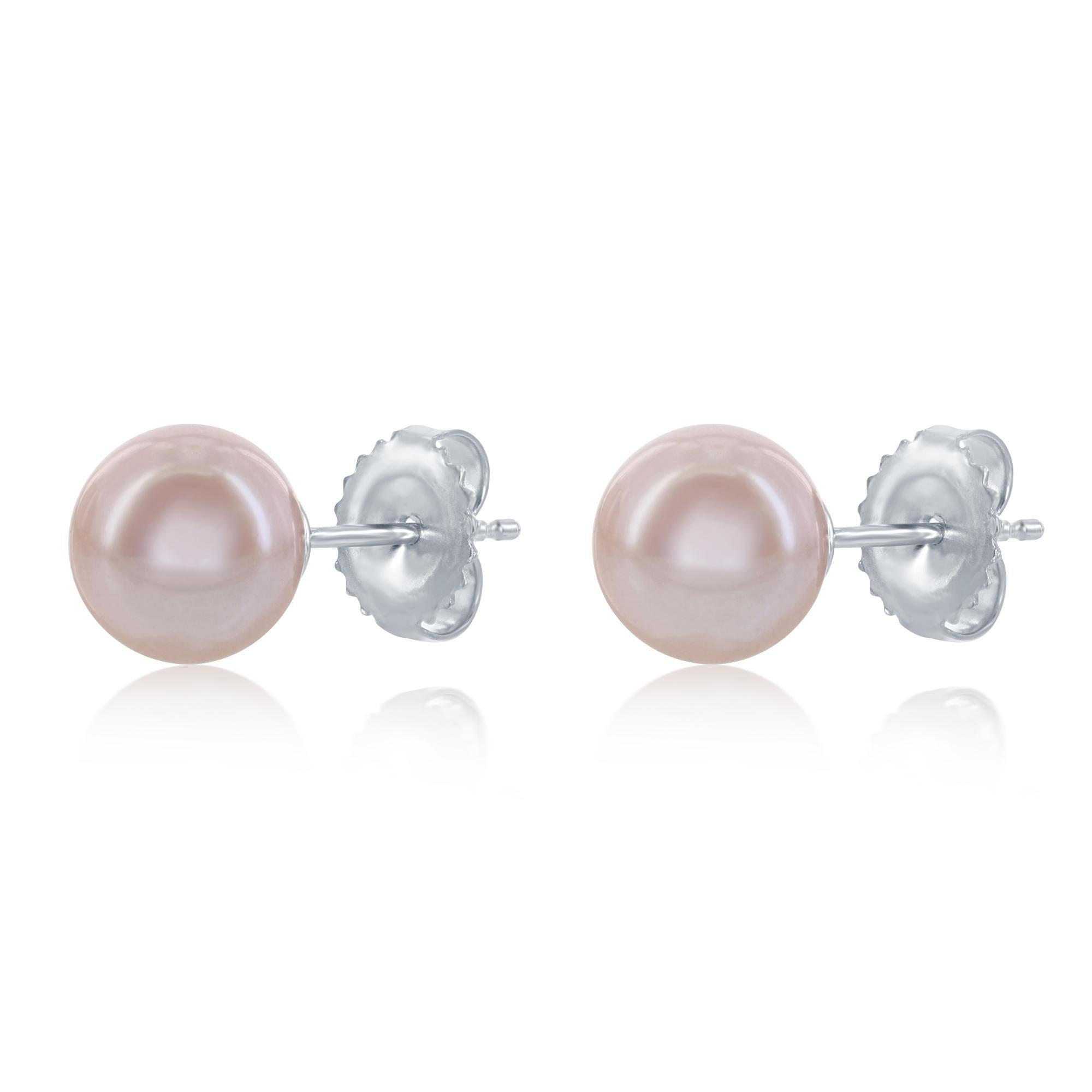 These Chinese freshwater cultured pearls are a natural pink color. The pearls are perfectly round 8-8.5mm pearls. The studs are set on 14 karat white gold. The gorgeous, versatile hue makes these earrings great for everyday casual elegance or