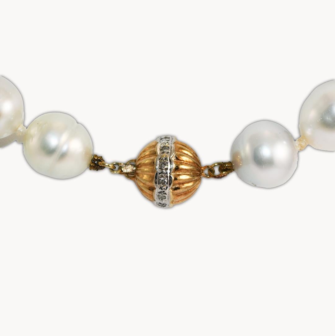 Semi-baroque white pearl strand. These are Chinese cultured freshwater pearls.
These days China is coming out with large freshwater pearls that are comparable to the best saltwater pearls.
Most people see the small cheap button or potato-shaped