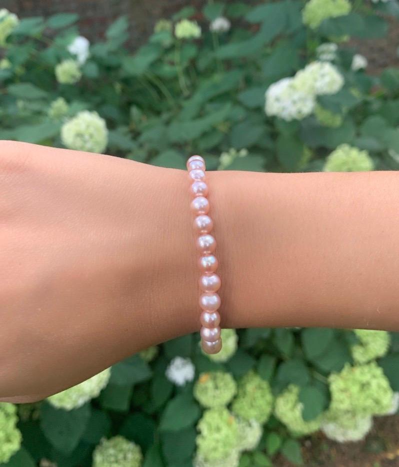 This stretch bracelet is made from Chinese freshwater, natural color pink, round cultured pearls measuring 6-6.5mm. Easy to put on and take off this bracelet presents a great way to add cultured pearls to your jewelry collection. 
