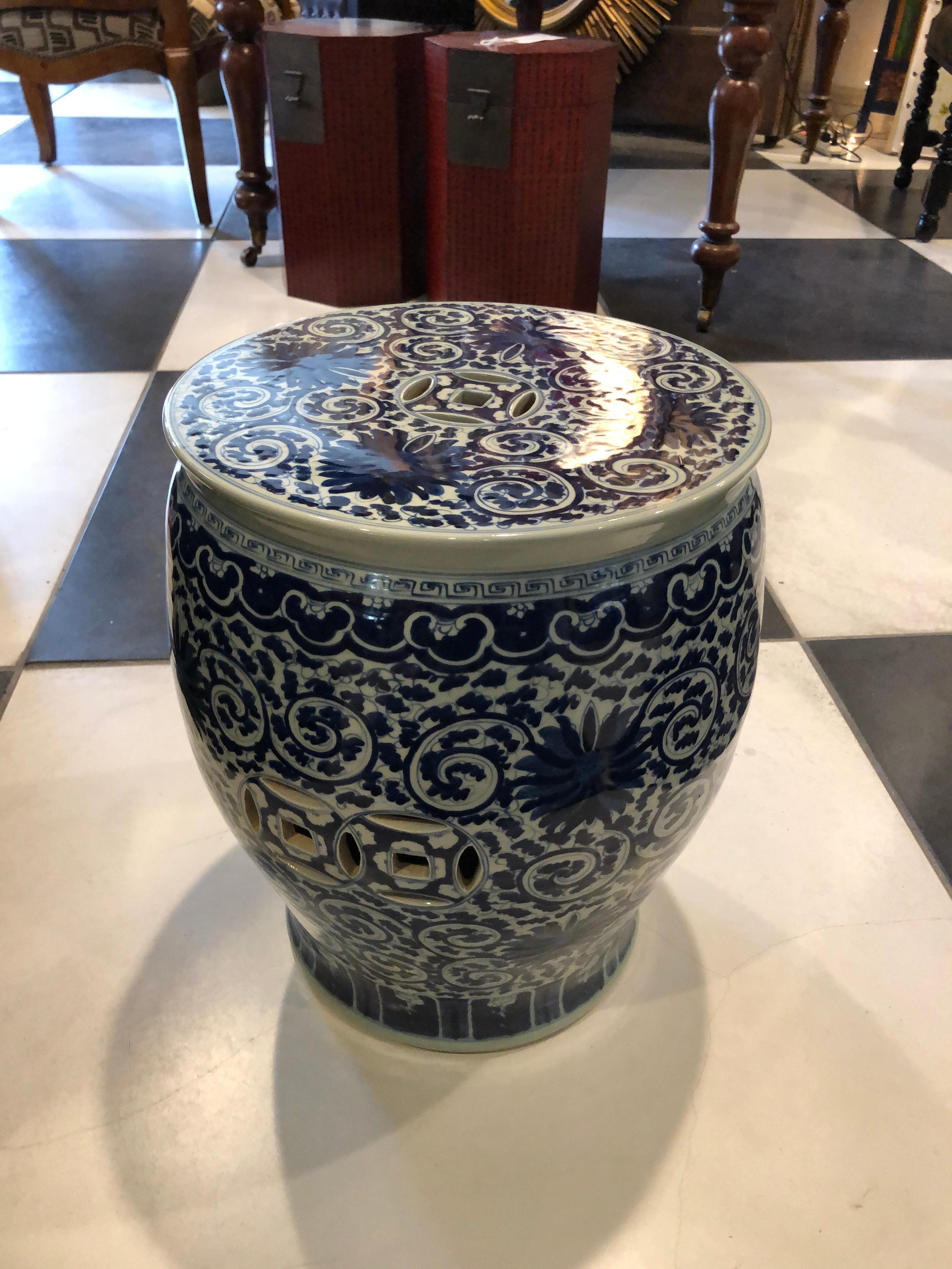 This Chinese Dark Blue & White Garden Seat can be used as an end table or side table made of Porcelain and hand painted in the Chrysanthemum design with 