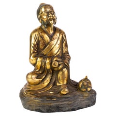Sculpture chinoise en bronze doré d'un immortel du 19ème siècle 