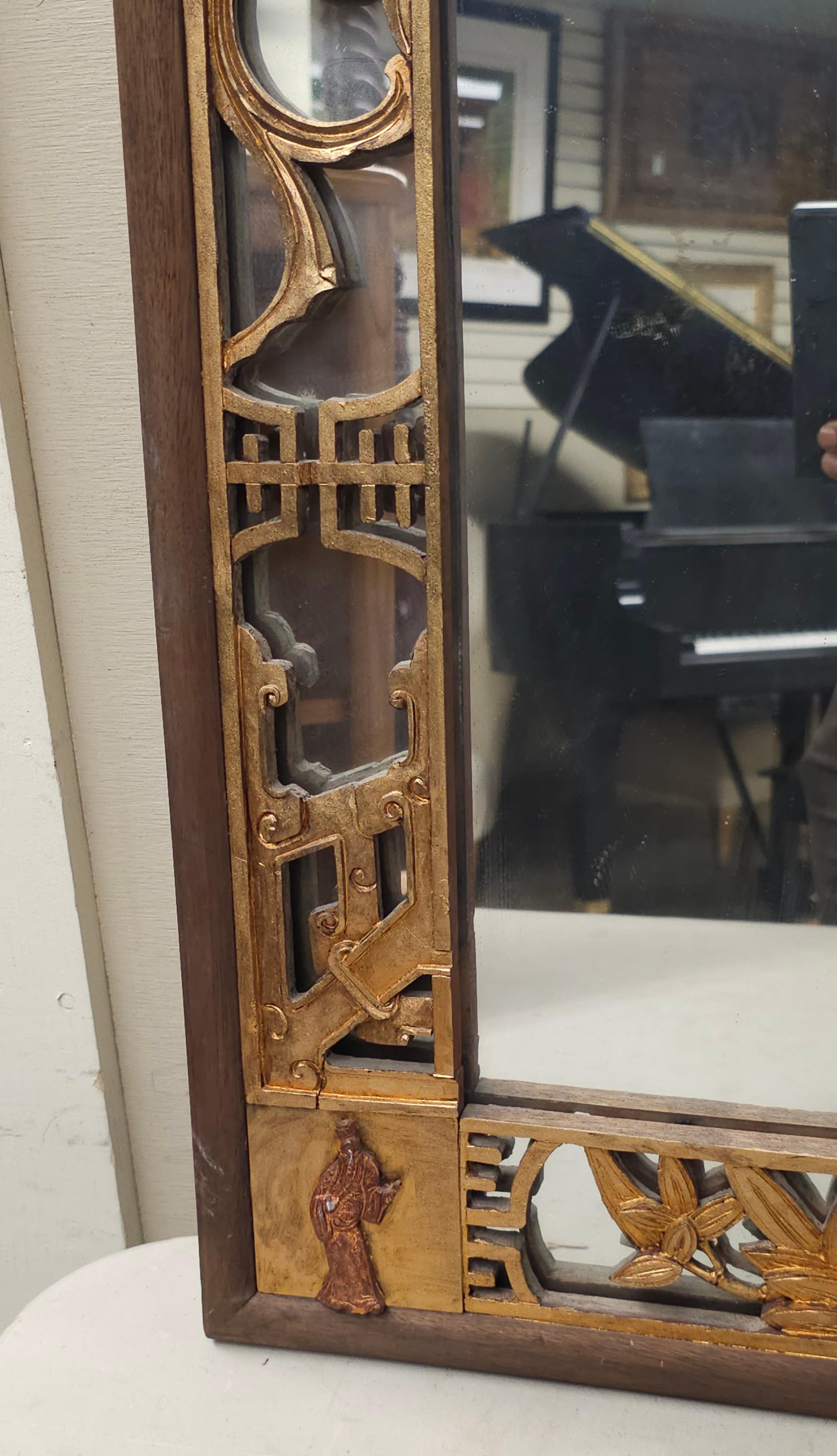 Chinese Gilt And Rouge Lacquered Carved and Mirrored Frame Wall Mirror In Good Condition For Sale In Germantown, MD