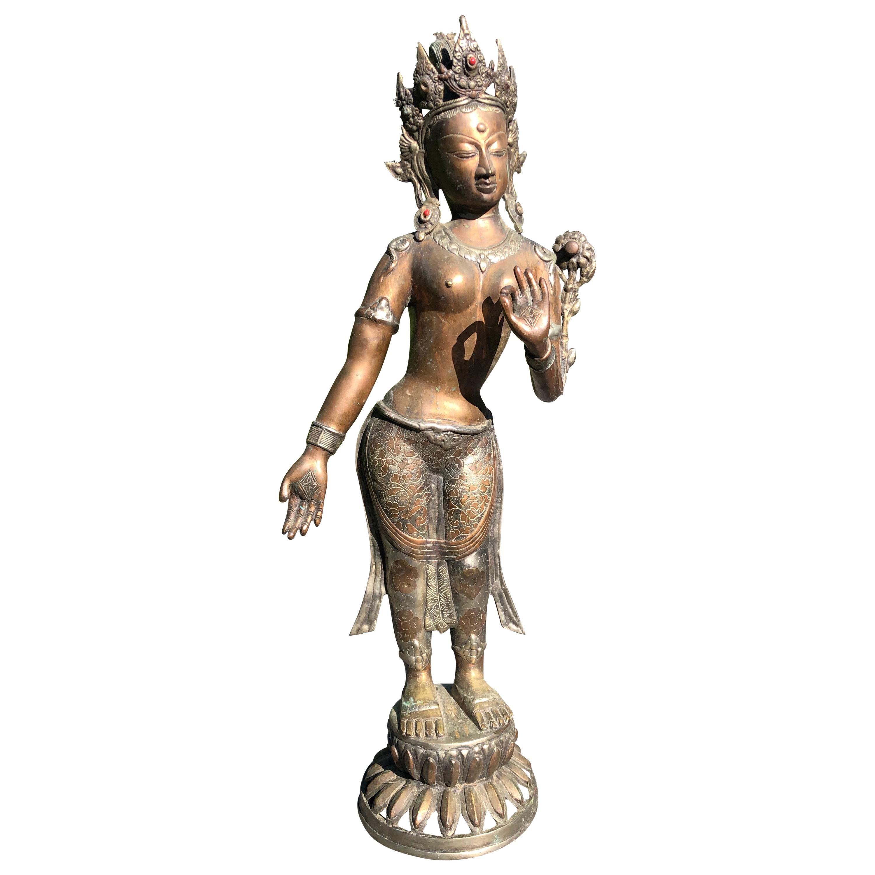 Chinese Gilt Bronze Figure of Standing Tara Inlaid Silver
