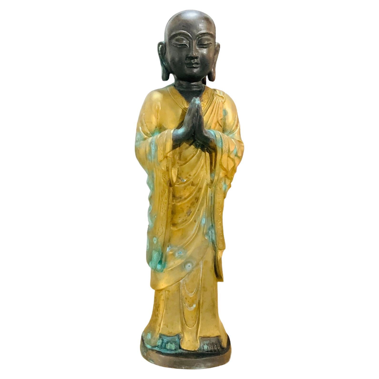 Chinese Gilt Patinated Bronze Small Sculpture of a Luohan For Sale