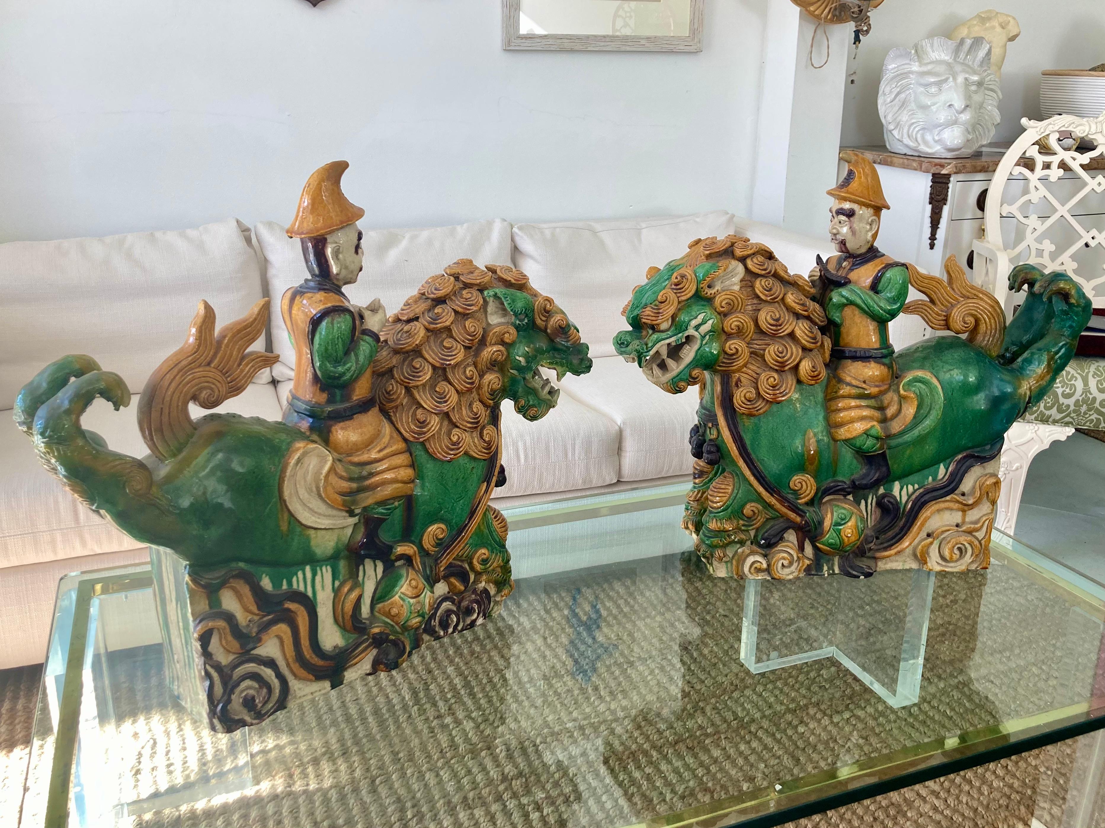 Beautiful pair of Chinese glazed terra cotta foo fogs roof tiles. Amazing sculpting details and colors.