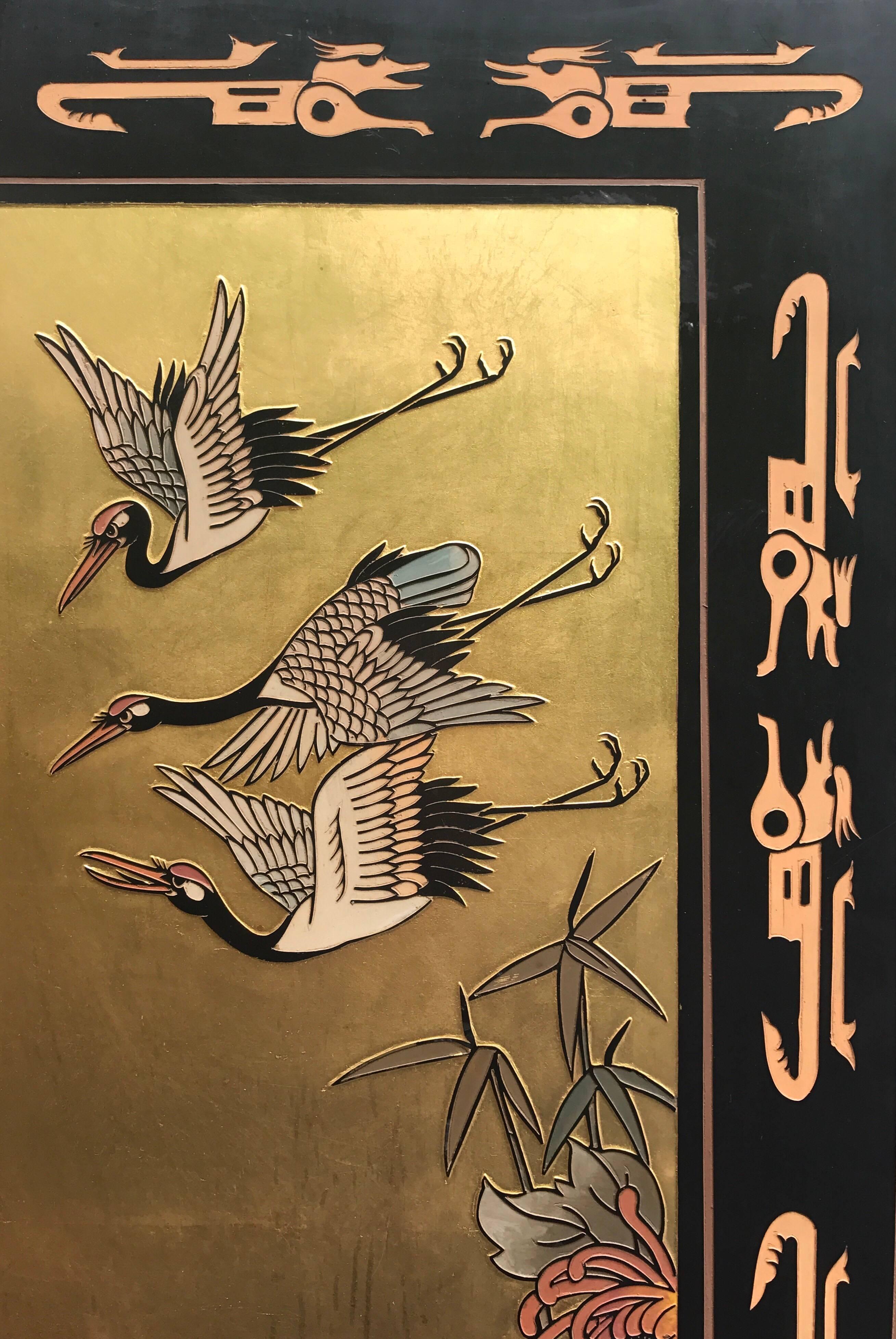 Beautiful Chinese six panel gold leaf coromandel screen with a painted motif of birds and flowers. Back is black lacquer with a more simple motif of incised rocks and foliage.