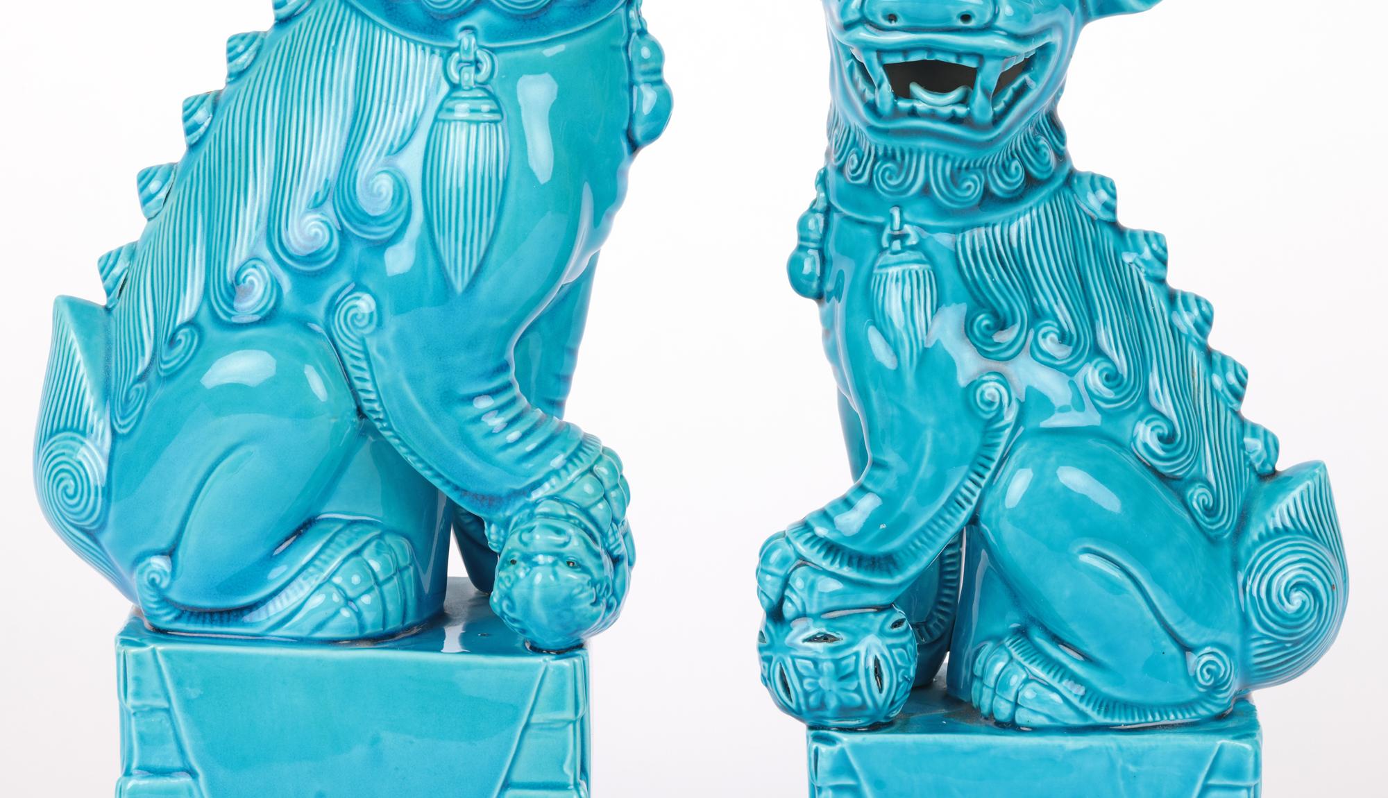 Mid-Century Modern Chinese Graduated Pair Turquoise Glazed Porcelain Mounted Foo Dogs For Sale