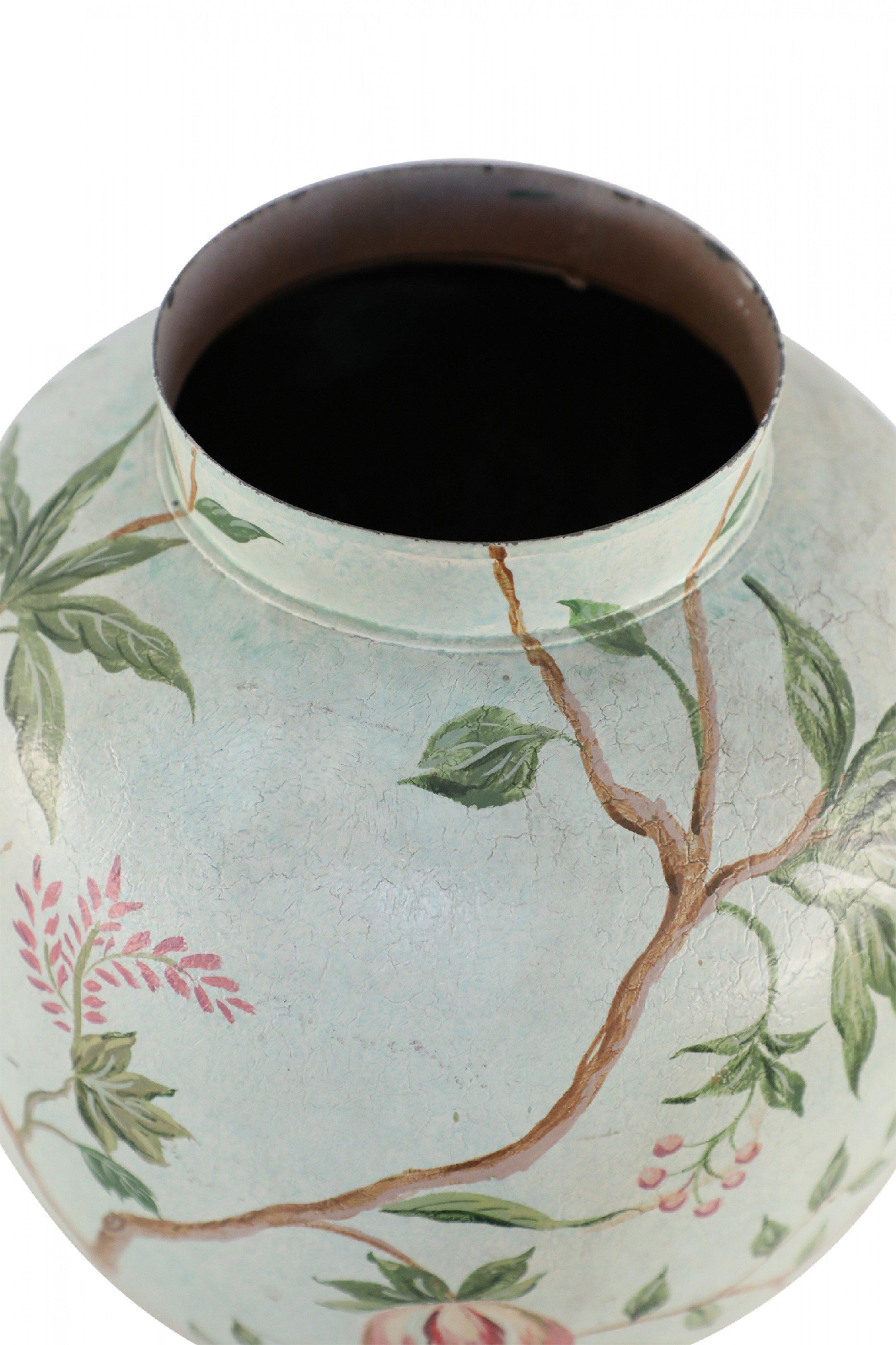 Chinese hand-made, light green tole urn painted with branches, fruit, and a dark green band at the base and finished with a finial atop its lid.
 