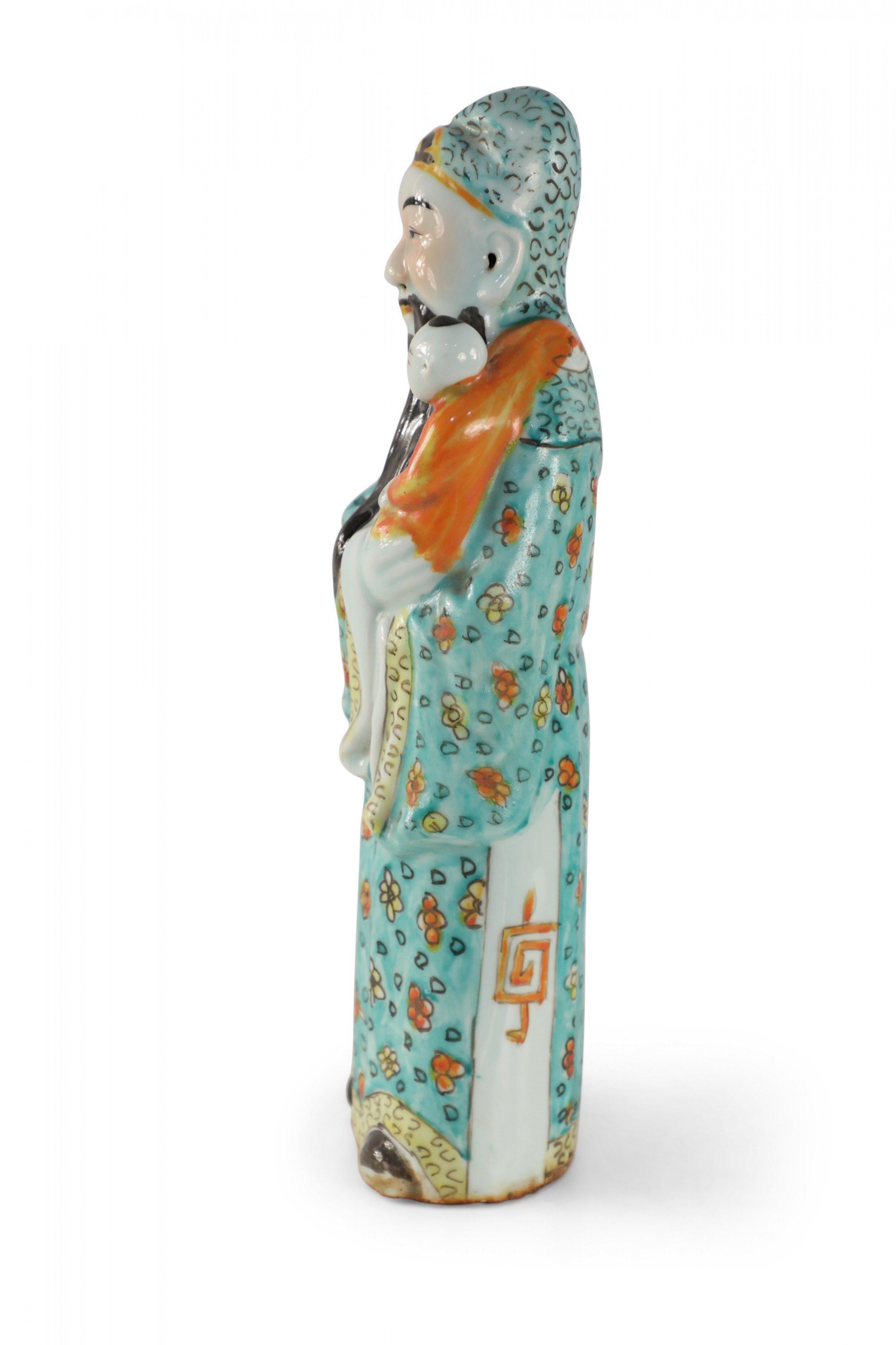 Antique Chinese (Early 20th Century) glazed porcelain statue of Lu Xing, one of the deities of the three stars considered essential in Chinese astrology, each representing an attribute of a good life. Xu Ling personifies wealth, influence and