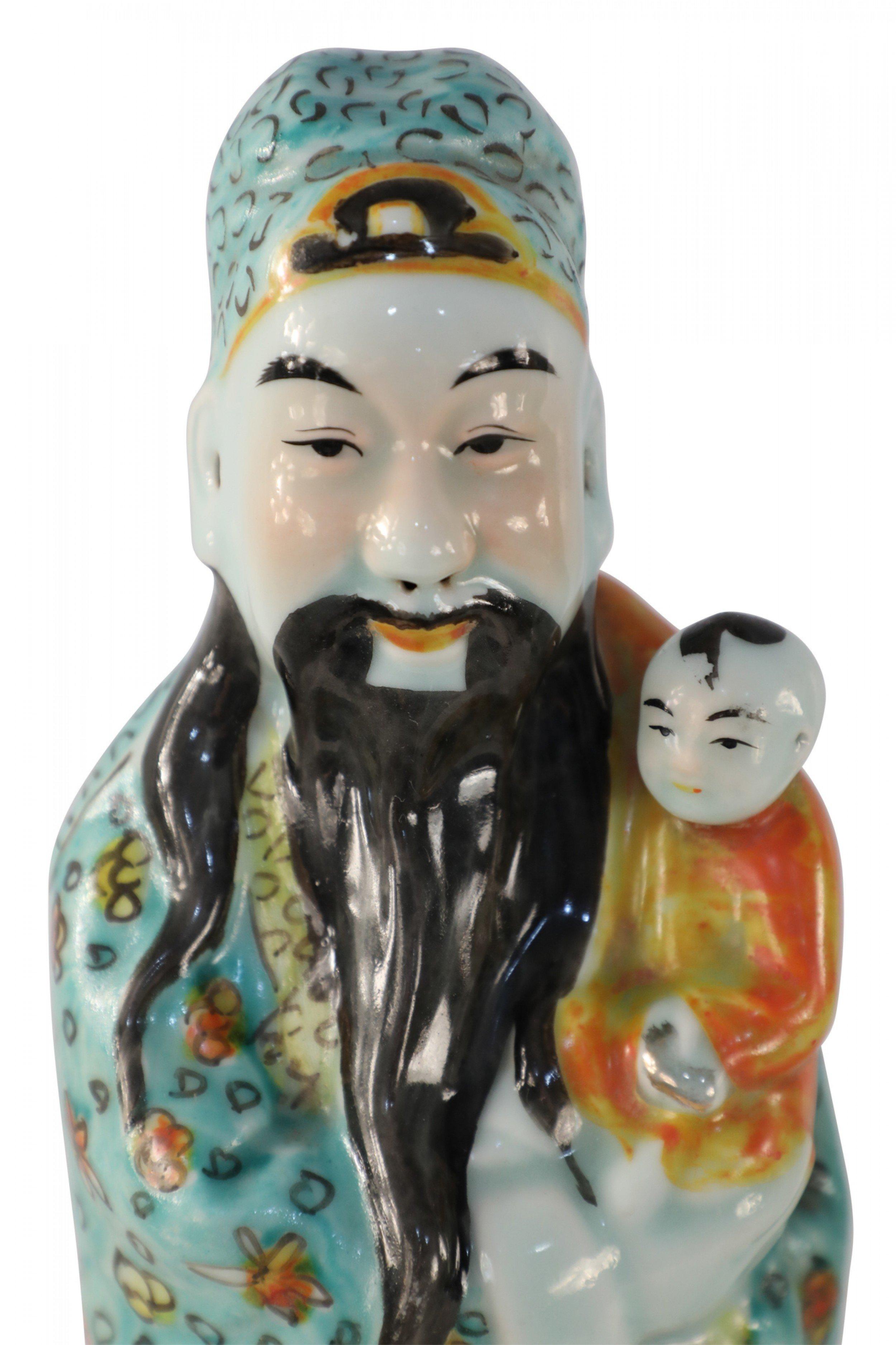 Chinese Export Chinese Green and Orange Lu Xing Wealth and Prosperity Deific Porcelain Figurine For Sale