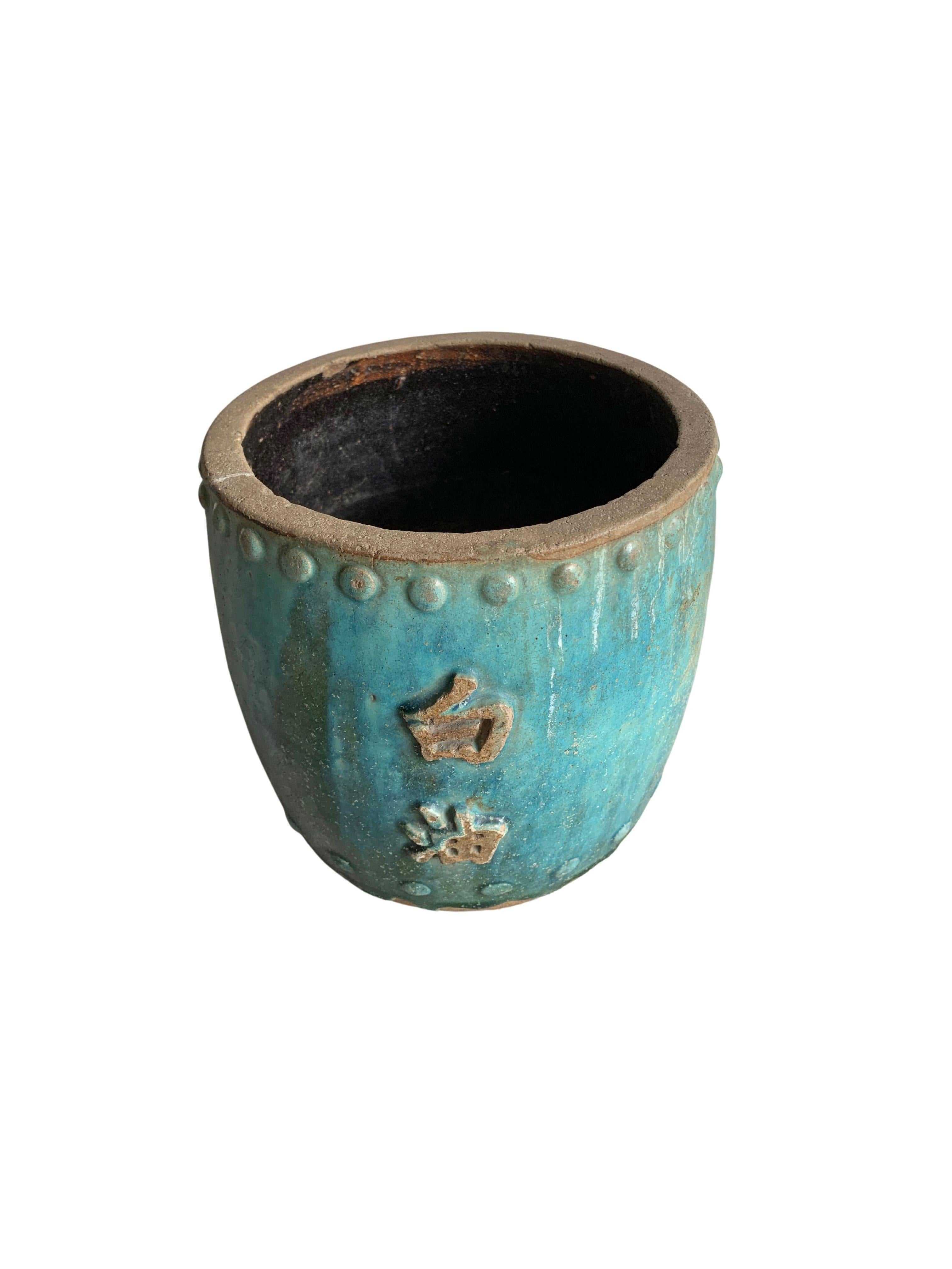 A wonderful green glaze adorns this Early 20th century Chinese ceramic 