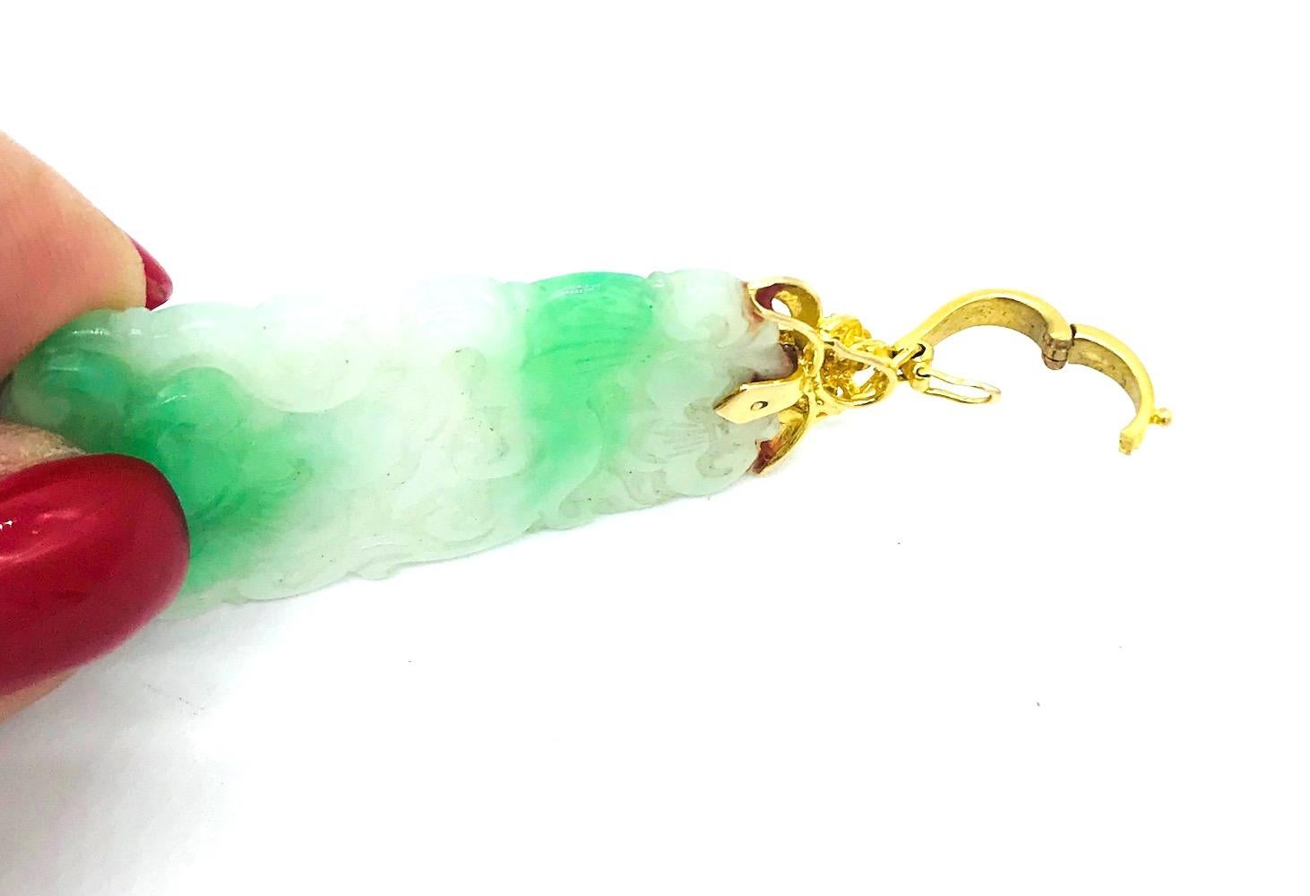 Chinese, Green Jade Carved Floral Pendant, Diamond
Enhancer open style pendant with 5-round diamonds. Pendant measures 2.5 inches tall complete and 1 inch wide. Quality pendant weight is 13.3 grams. 14 karat yellow gold. Diamonds are VS H color,