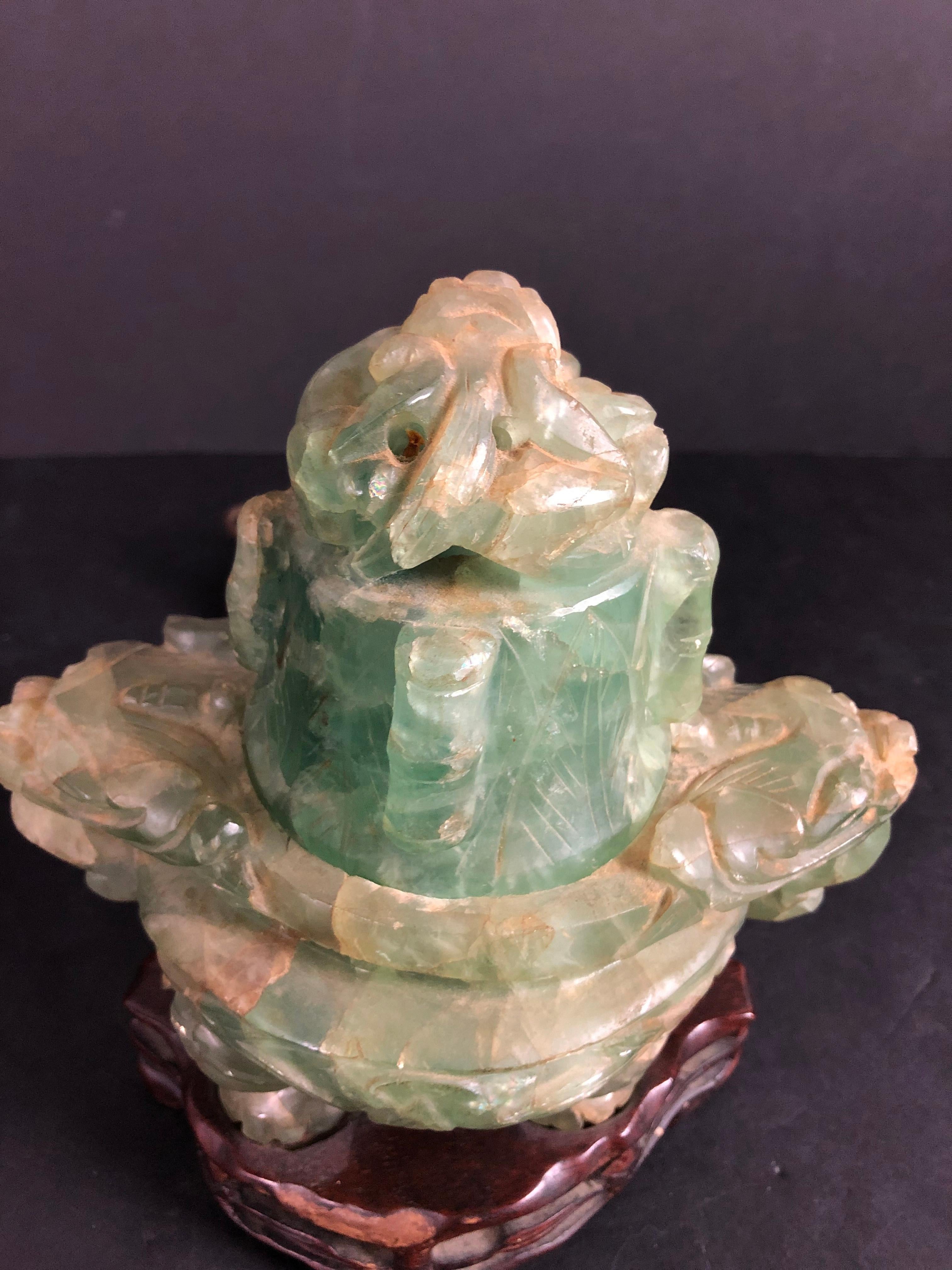 Chinese carved green quartz censer converted to a lamp, with fitted wood base. Foo lion handles and dragon on removable cover. Perfect as a decorative night light.

     