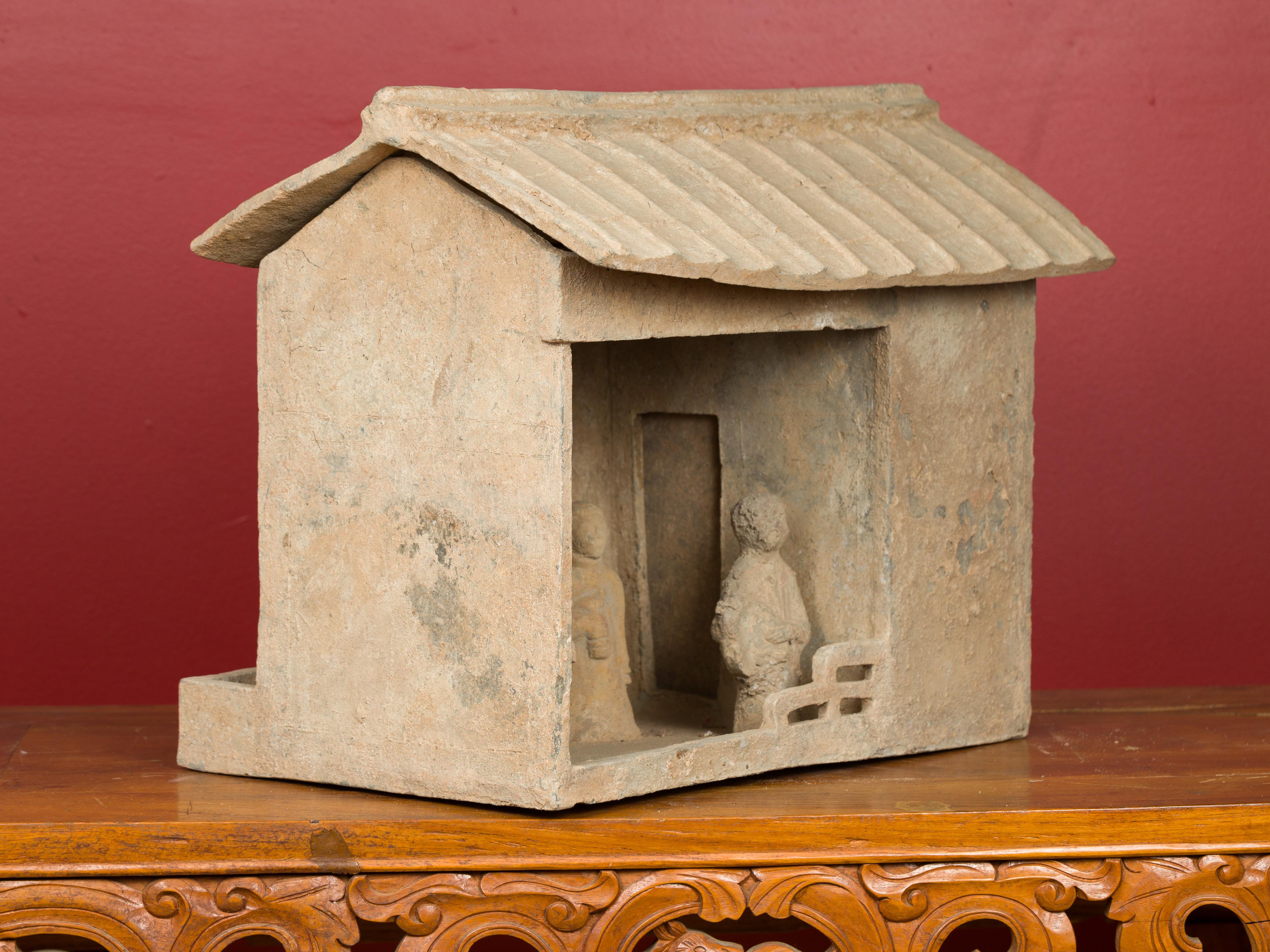 Modèle de maison Mingqi de la dynastie chinoise des Han avec ses habitants, vers 206 av. J.-C. - 221 ap. J.-C. 2