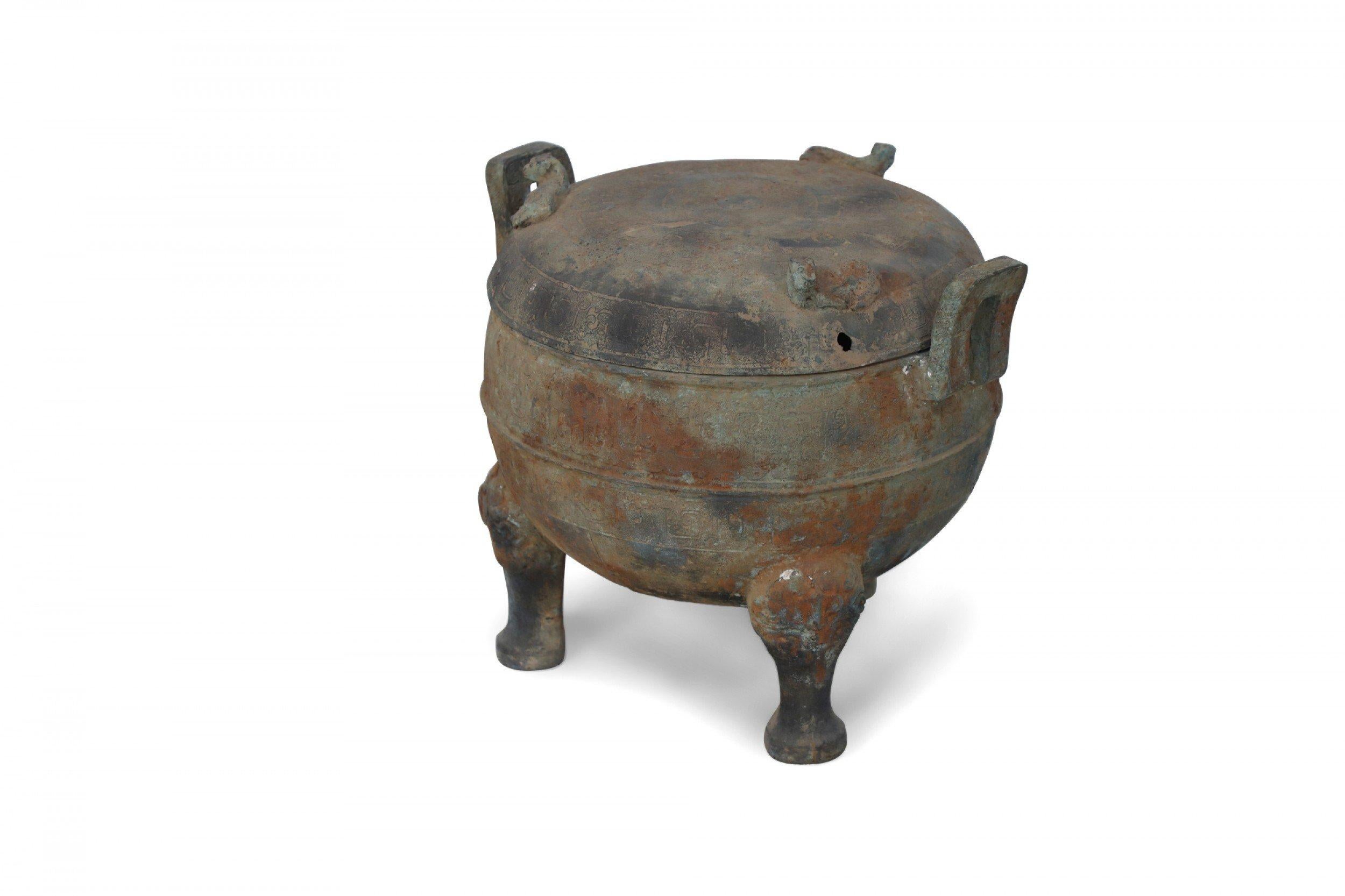 Chinese Han Dynasty Style Patinated Bronze Footed and Lidded Pot In Good Condition For Sale In Queens, NY