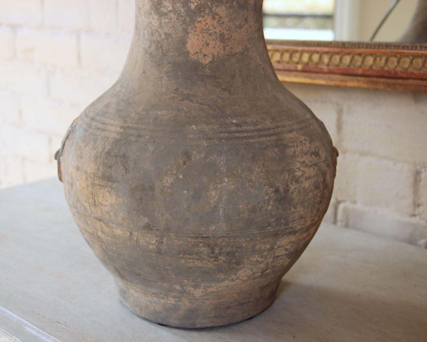 Ceramic Chinese Han Dynasty Large Unglazed Jar with Taotie Masks Mounted as Table Lamp For Sale