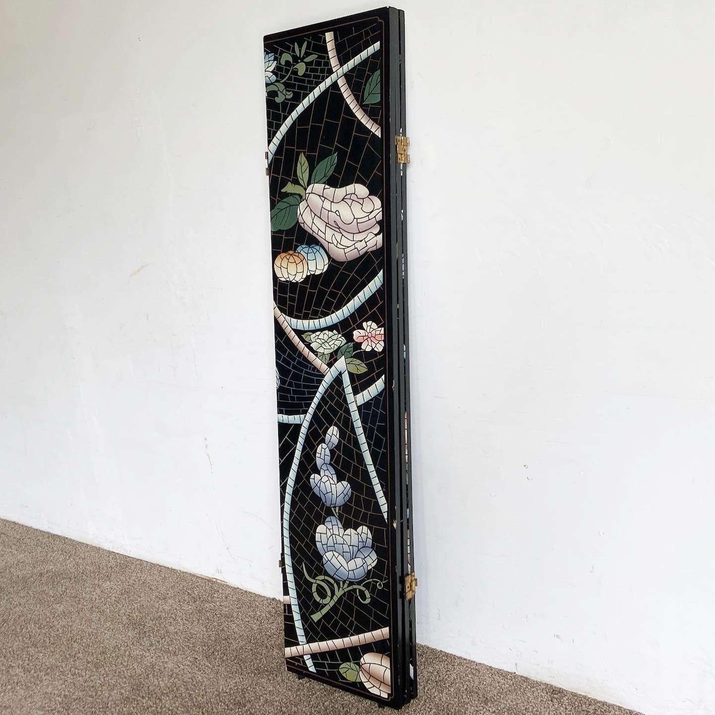 Add elegance and functionality to your space with this wonderful vintage Chinese room divider. The black lacquered divider showcases a hand carved and painted floral design on both sides, providing a stylish and versatile partition.

Vintage Chinese
