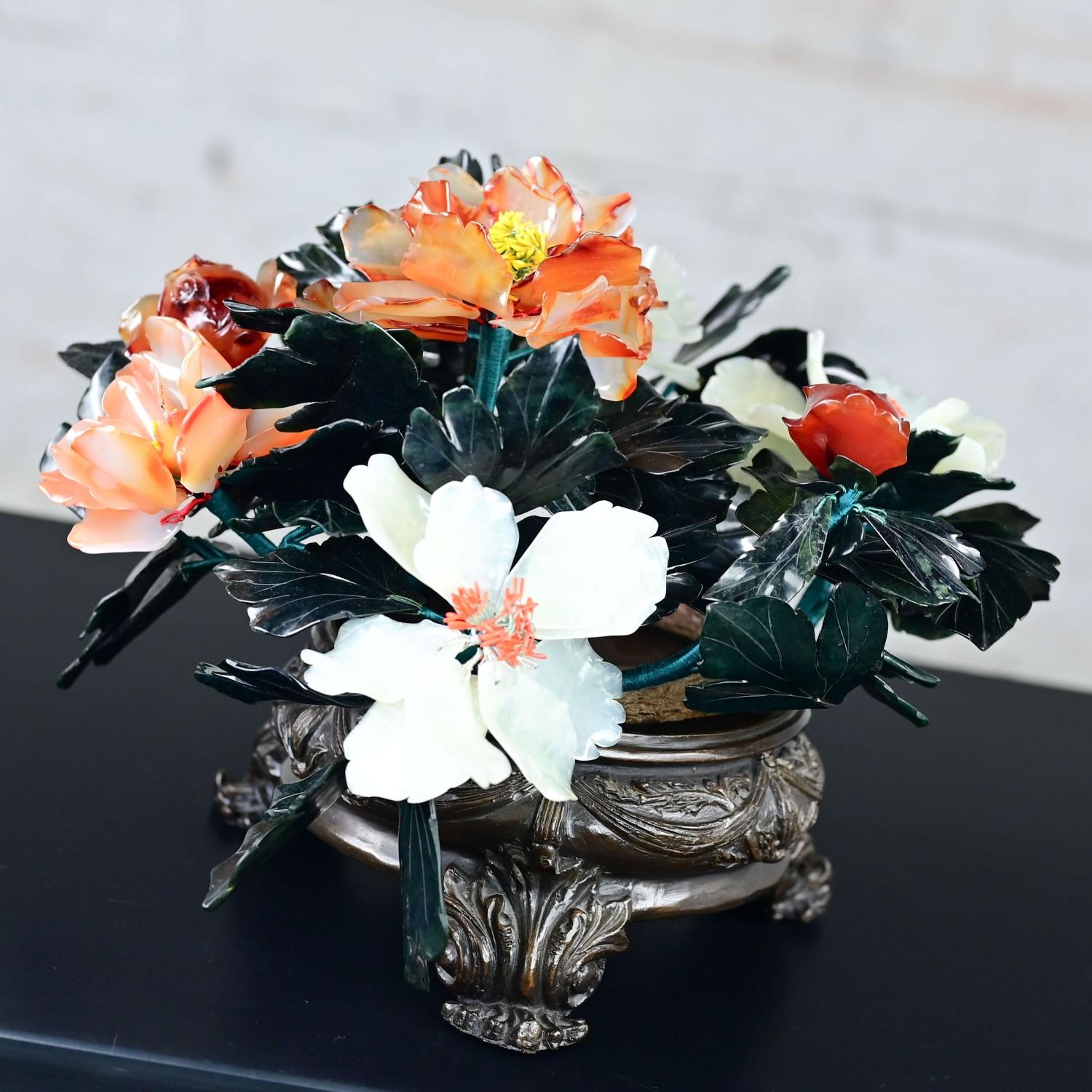 Gorgeous vintage Chinese hand carved hardstone centerpiece composed of carnelian, jade, & quartz with a cast bronze base. Beautiful condition, keeping in mind that this is vintage and not new so will have signs of use and wear even if it has been