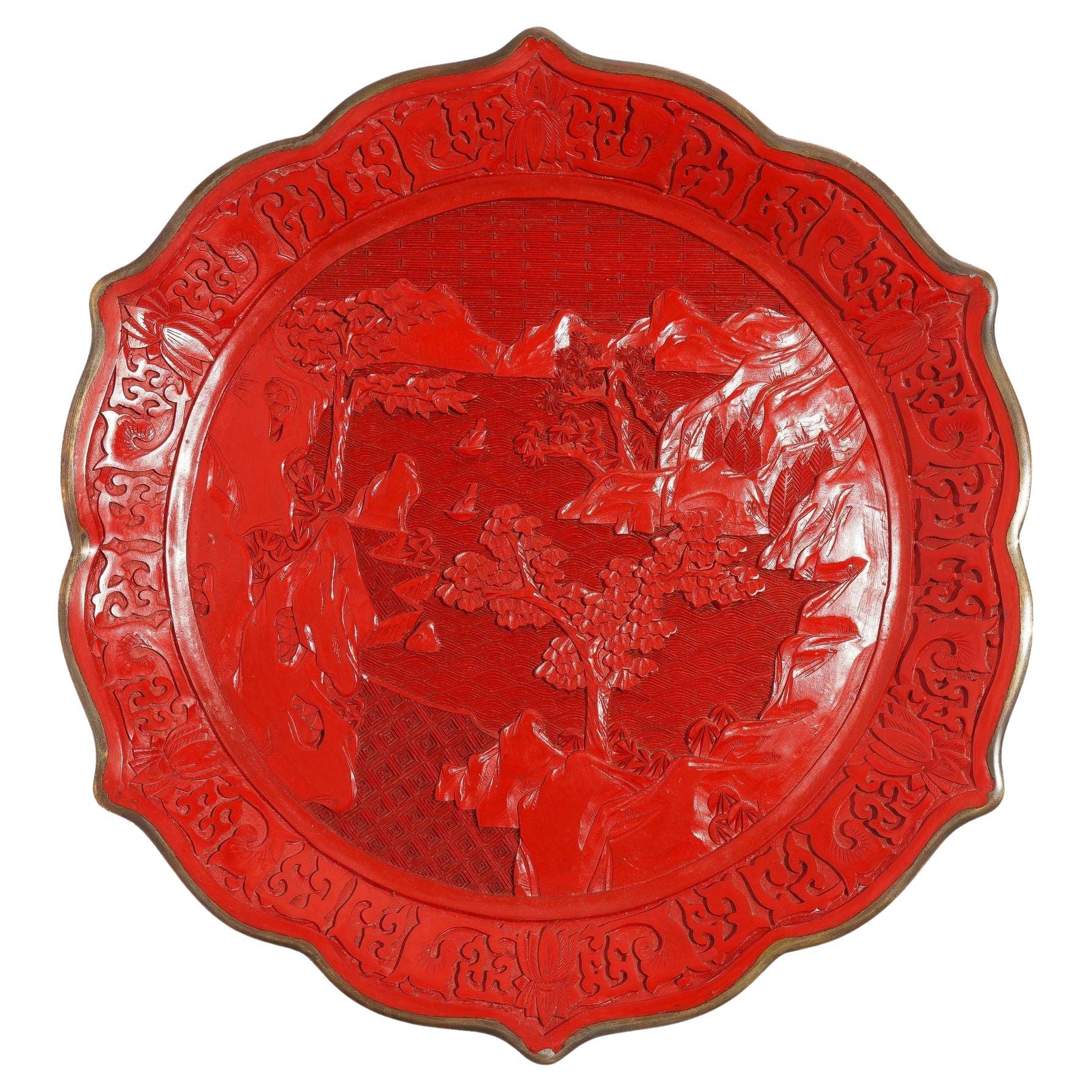 Chinese hand carved cinnabar plate on brass, c. 1850 For Sale